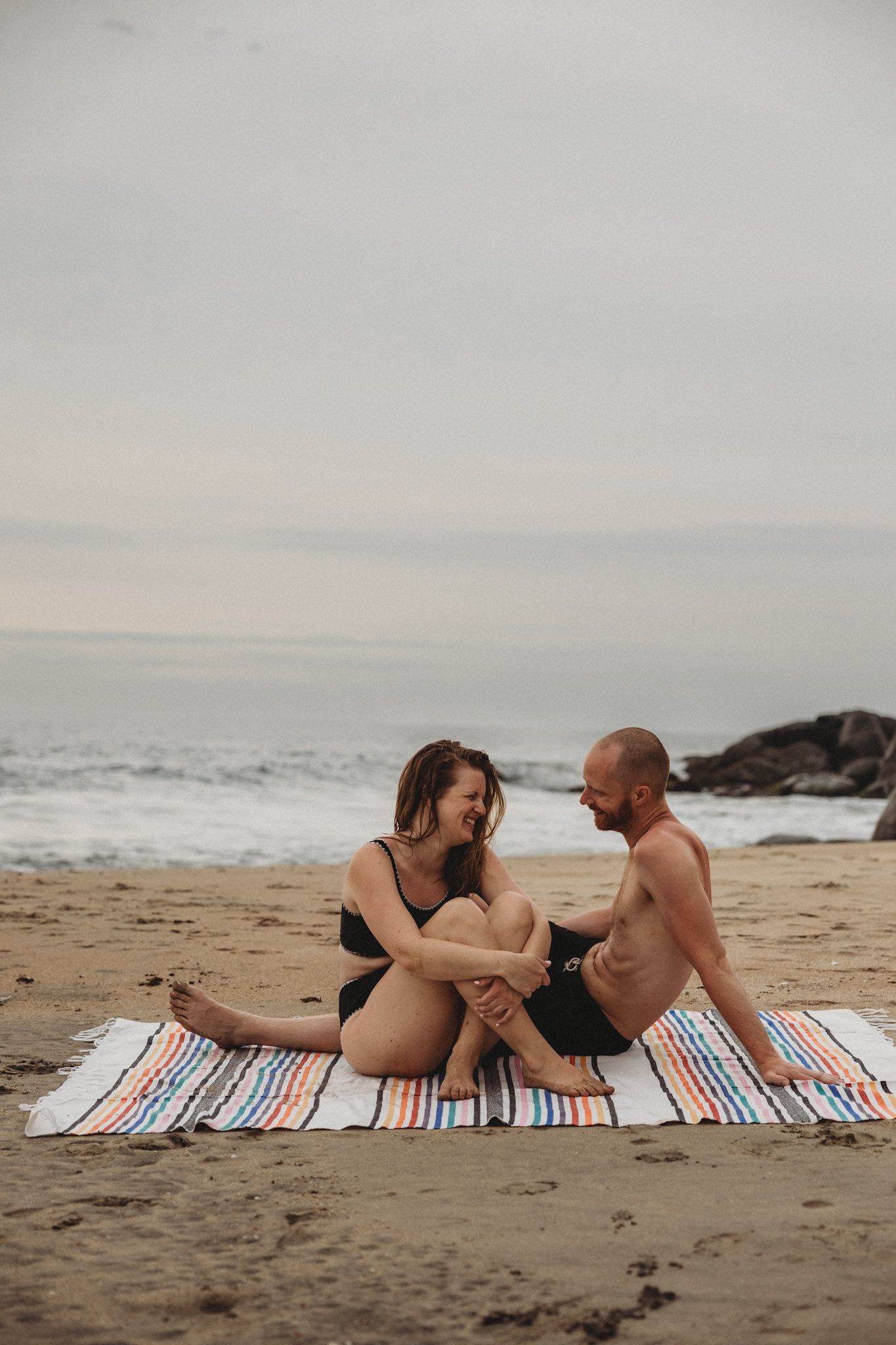 Photos of a couple on the beach taken by a Calgary Family Photographer.