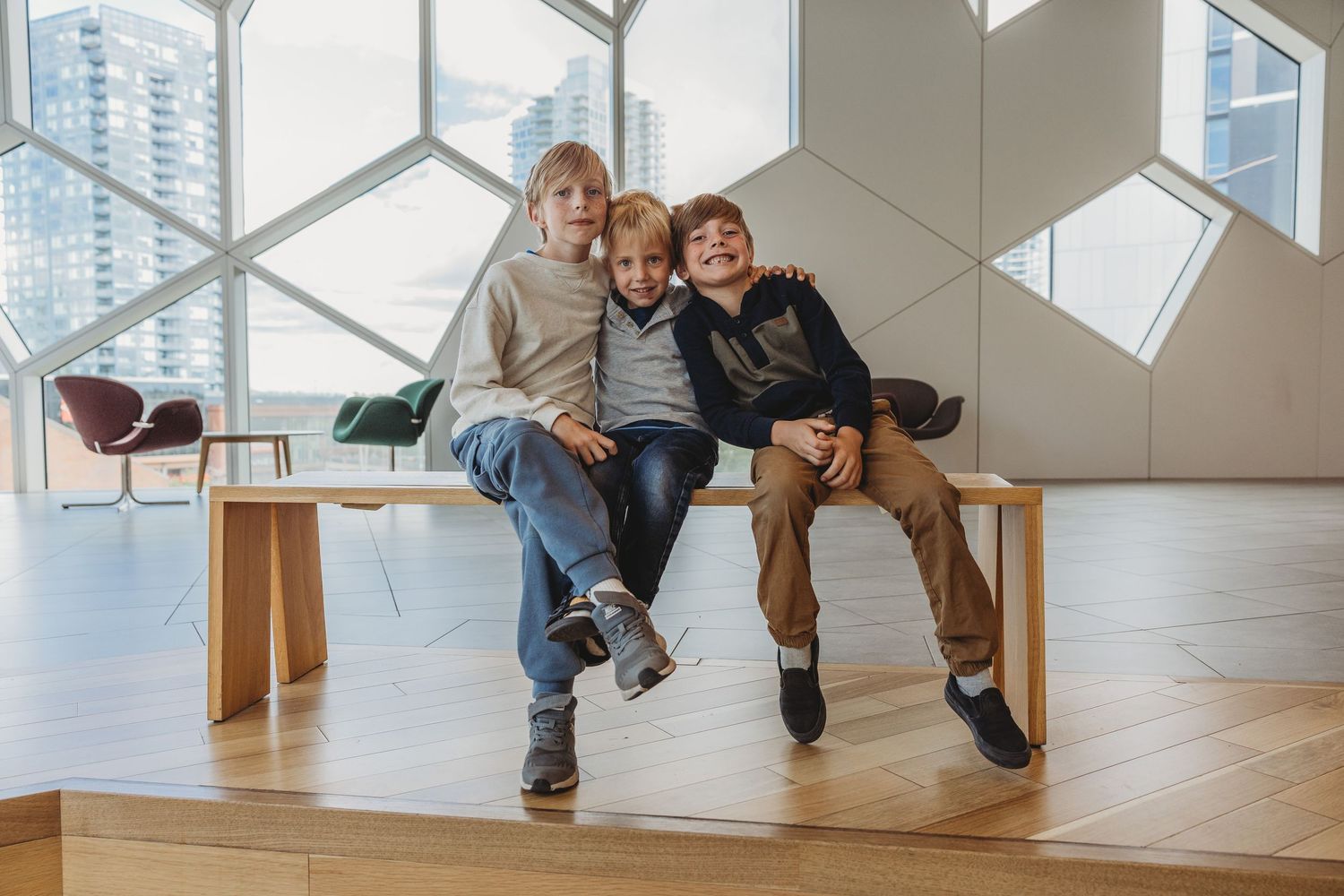 Family photo of brothers in a Calgary family photography session at the Central Calgary Public Library.