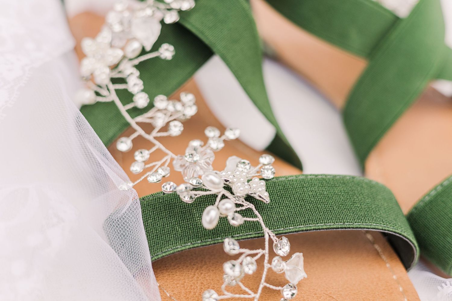 Wedding sandal with green straps decorated with delicate crystal flower embellishments.