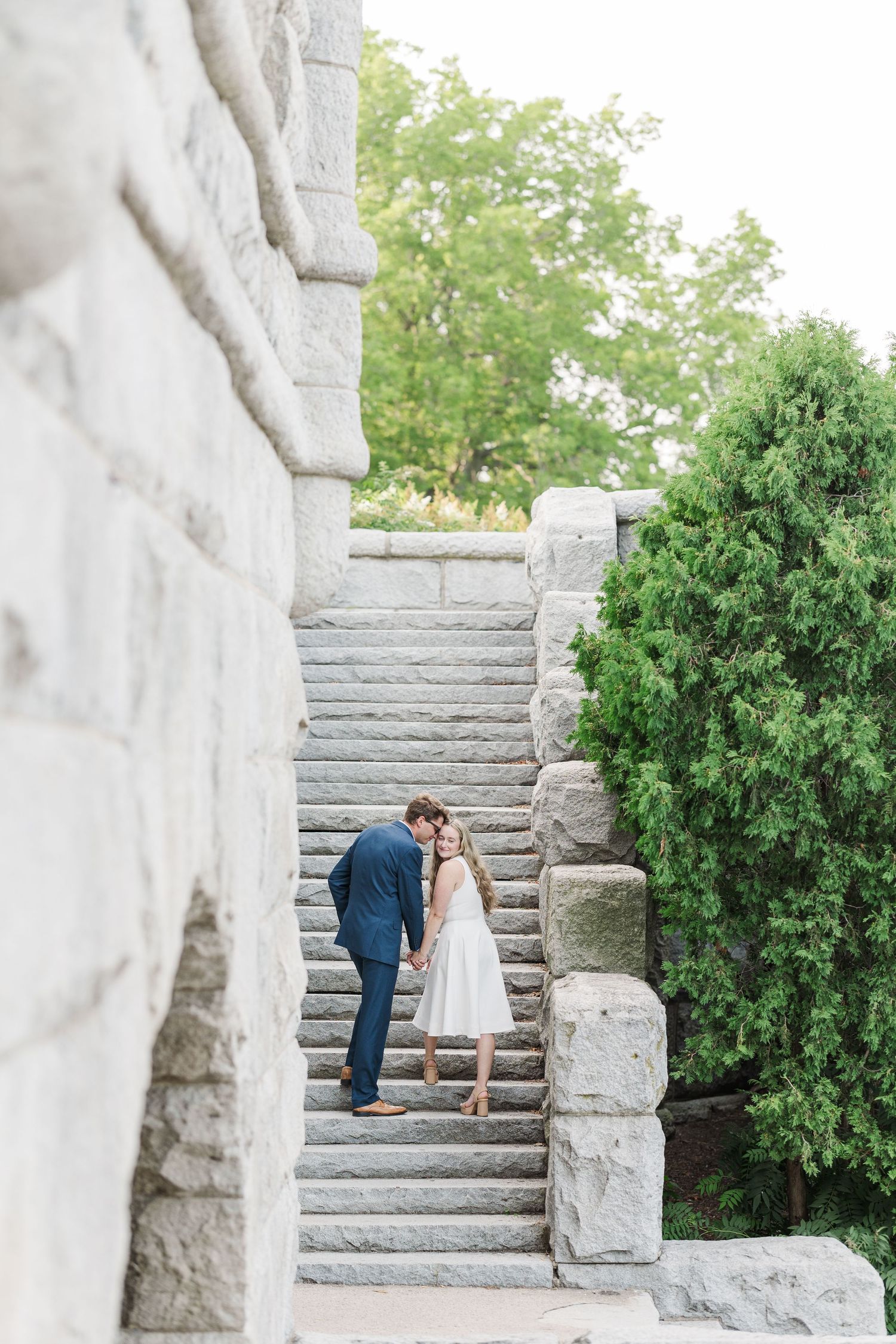 Elizabeth and Joe walking up the steps in the Ulysses S. Grant Monument in Lincoln Park, Chicago