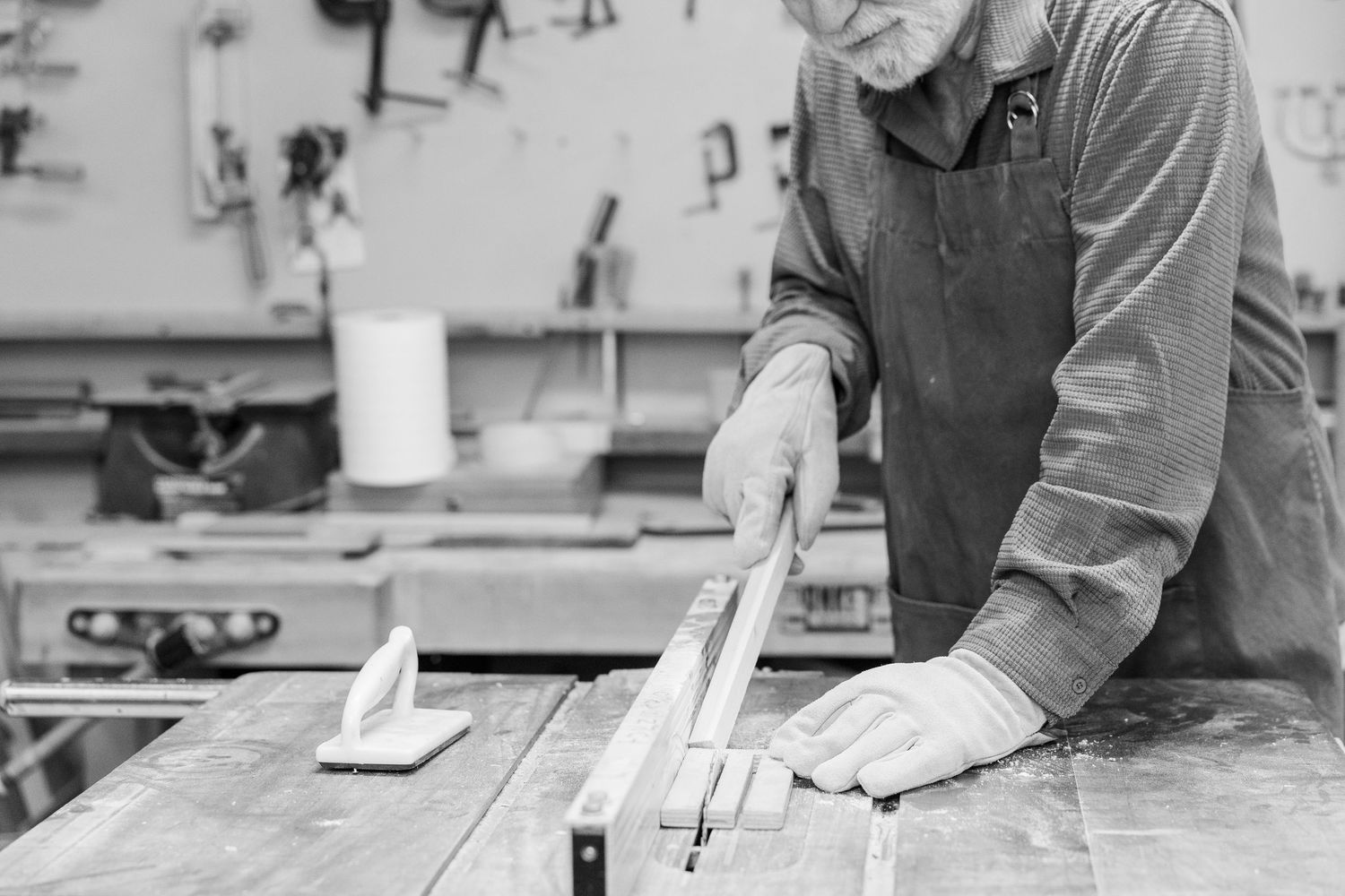 Black and white Beacon Hill senior living branding photo in Lombard, Illinois featuring woodworking bench