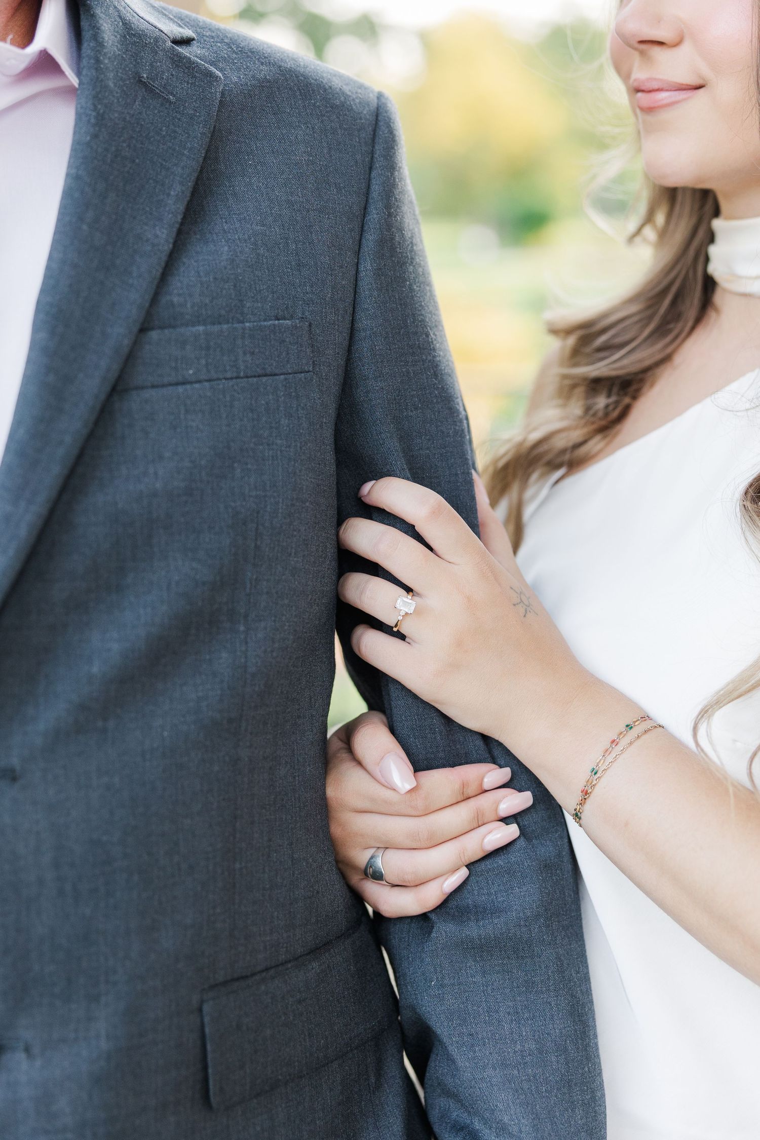 Close-up of couple embrace during engagement photos at Cantigny Park in Wheaton, Illinois