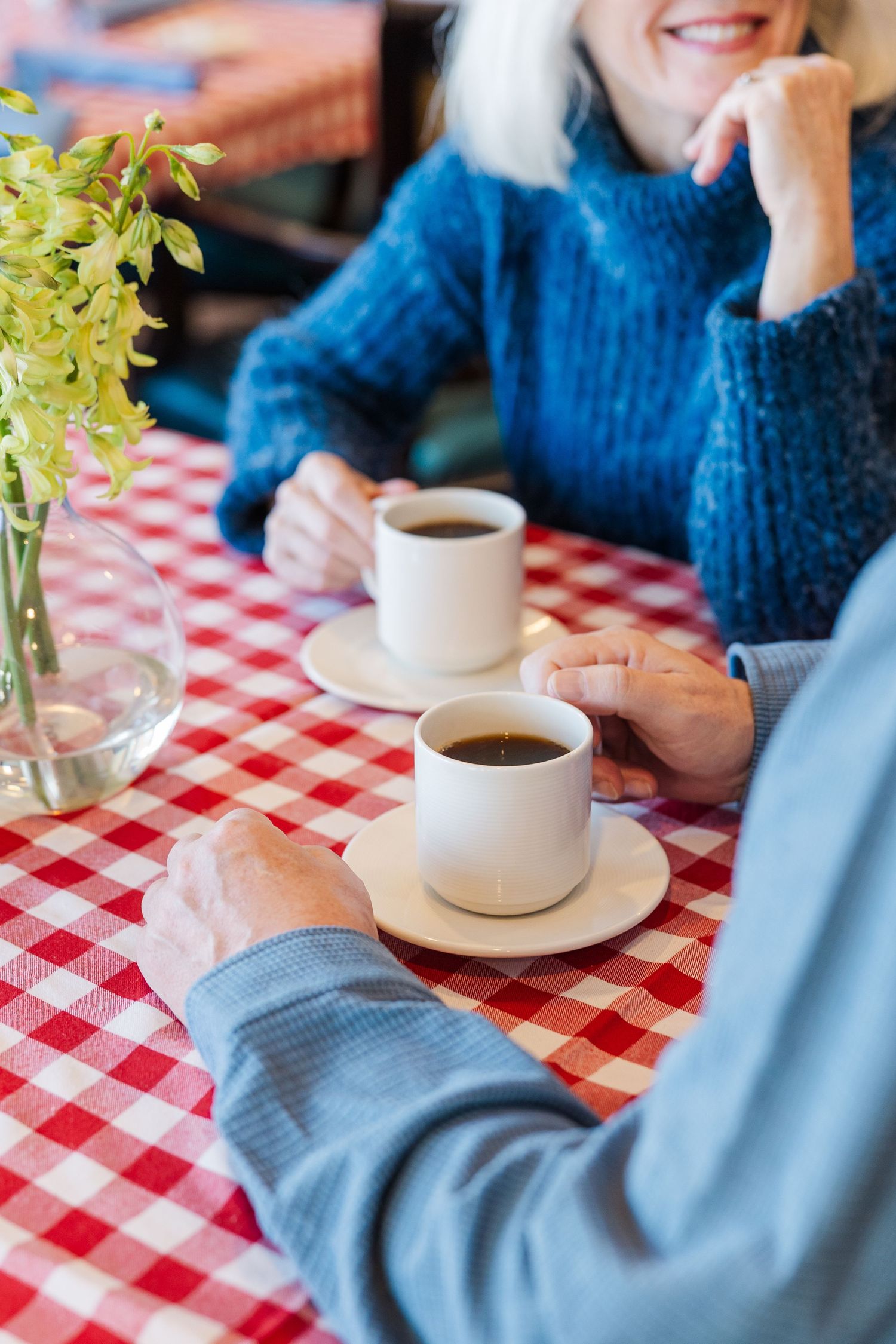 Beacon Hill senior living branding photo in Lombard, Illinois featuring residents sharing coffee