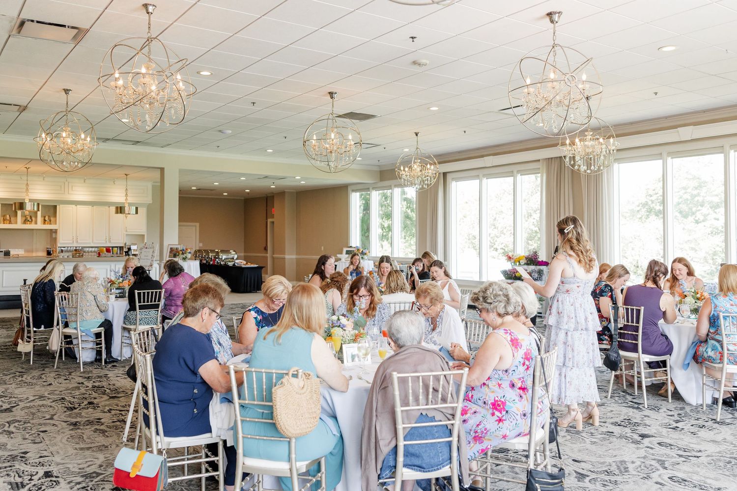 Full reception room view of guests seated at Itasca Country Club bridal shower