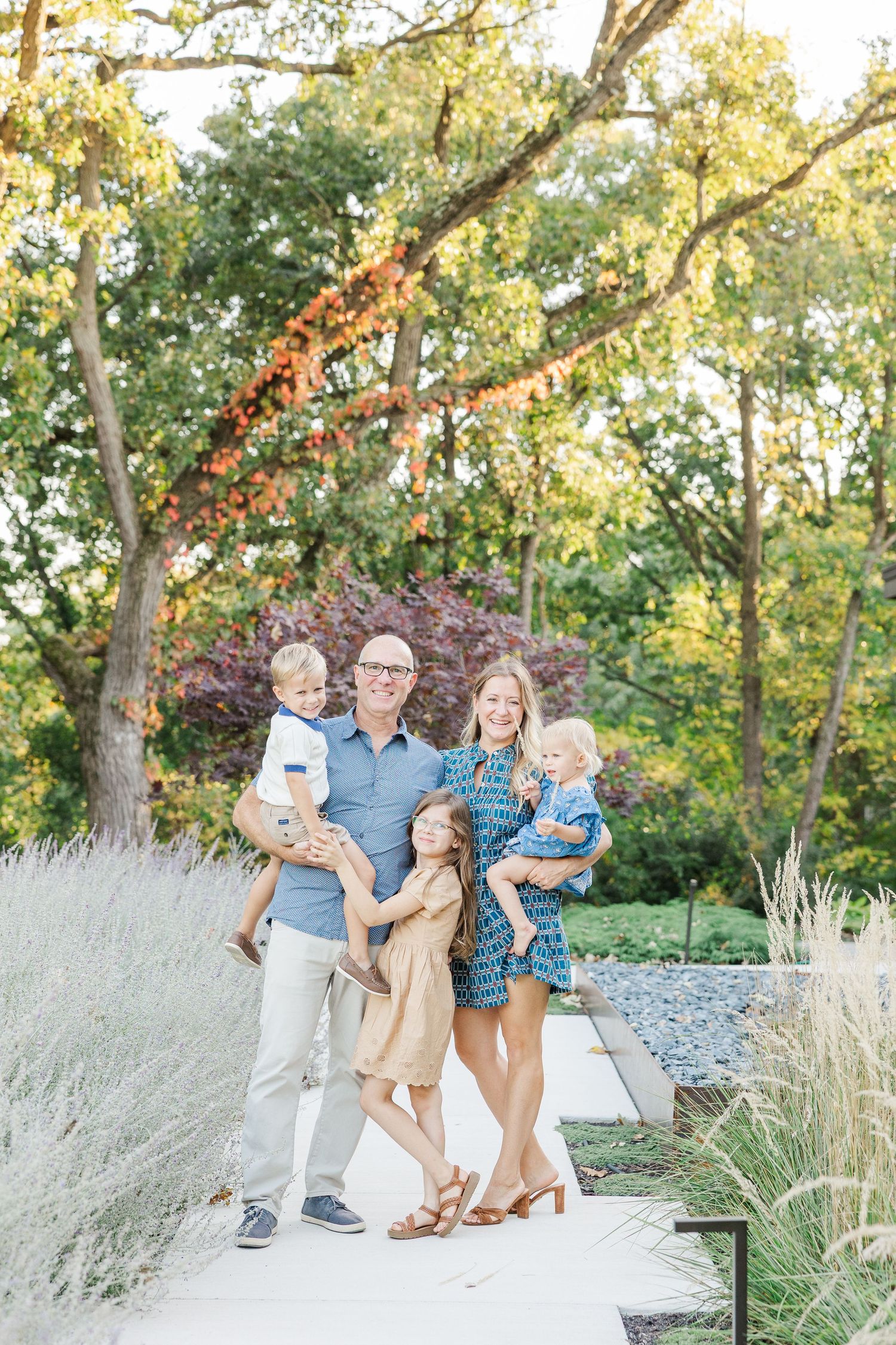 Family portrait at home in St. Charles, Illinois with parents and three young children