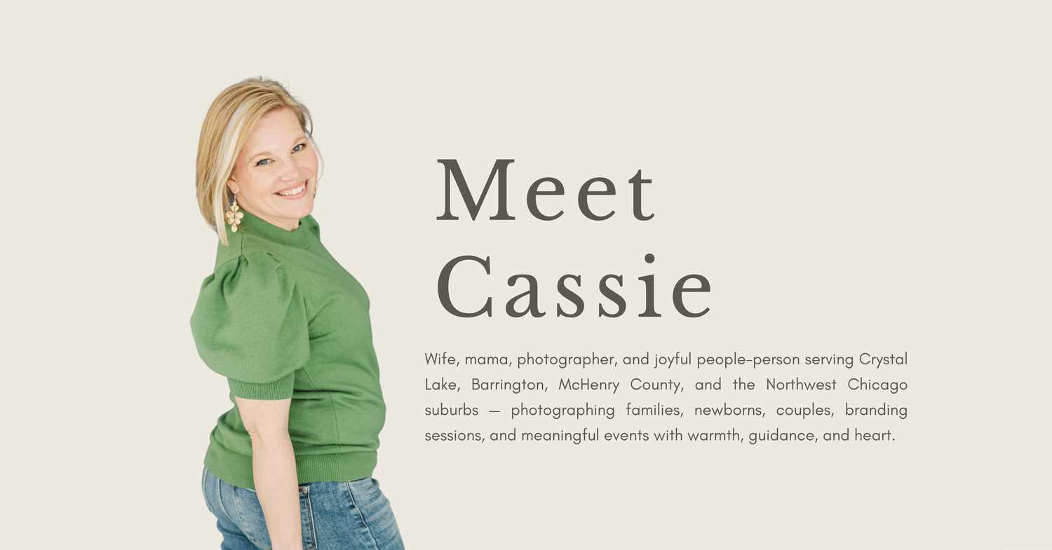 Cassie Lacina smiling in a green sweater on the About page of Cassie Lacina Photography