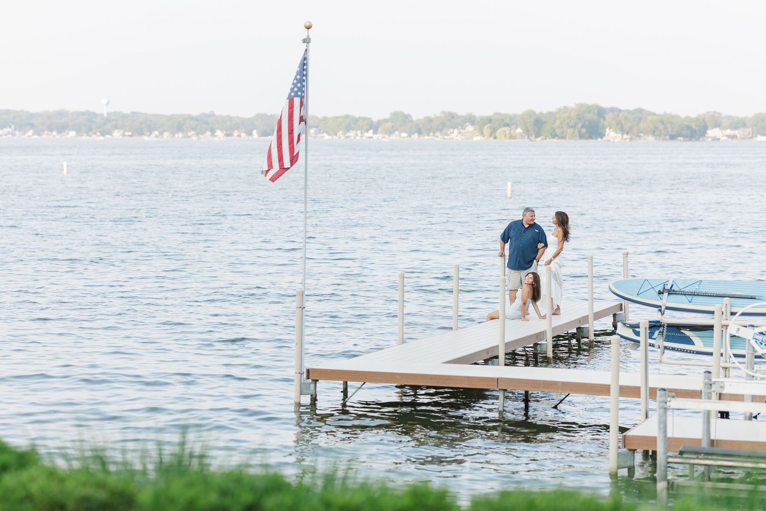 Couple on dock during Pistakee Lake family photos in Johnsburg, Illinois