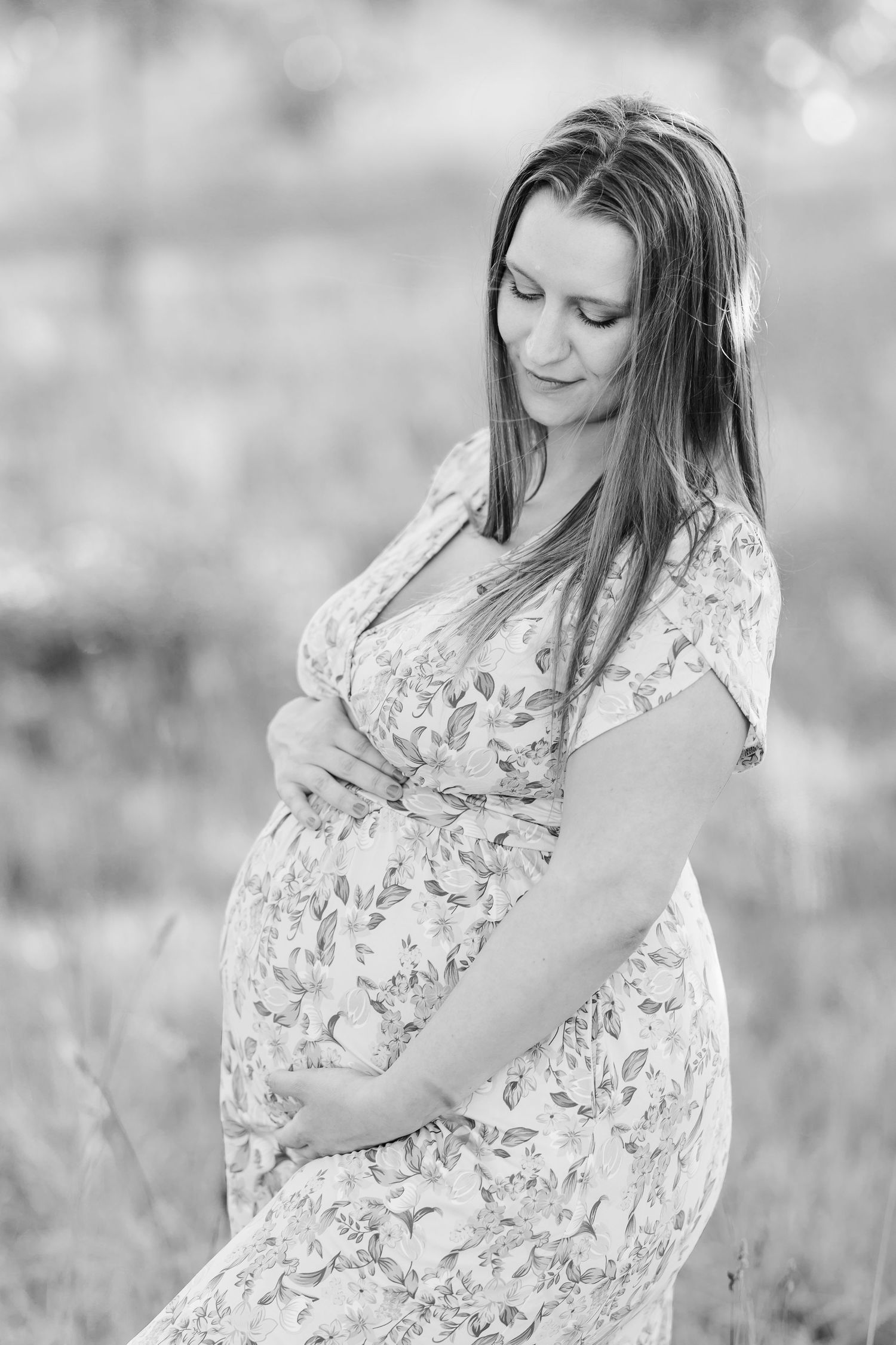 Black and white solo maternity portrait in the gardens during a Cantigny maternity session in Wheaton