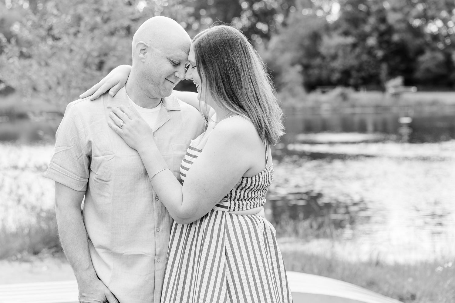 Black and white parent portrait during a relaxed family session at Shamrock Hills Park in Crystal Lake, Illinois.