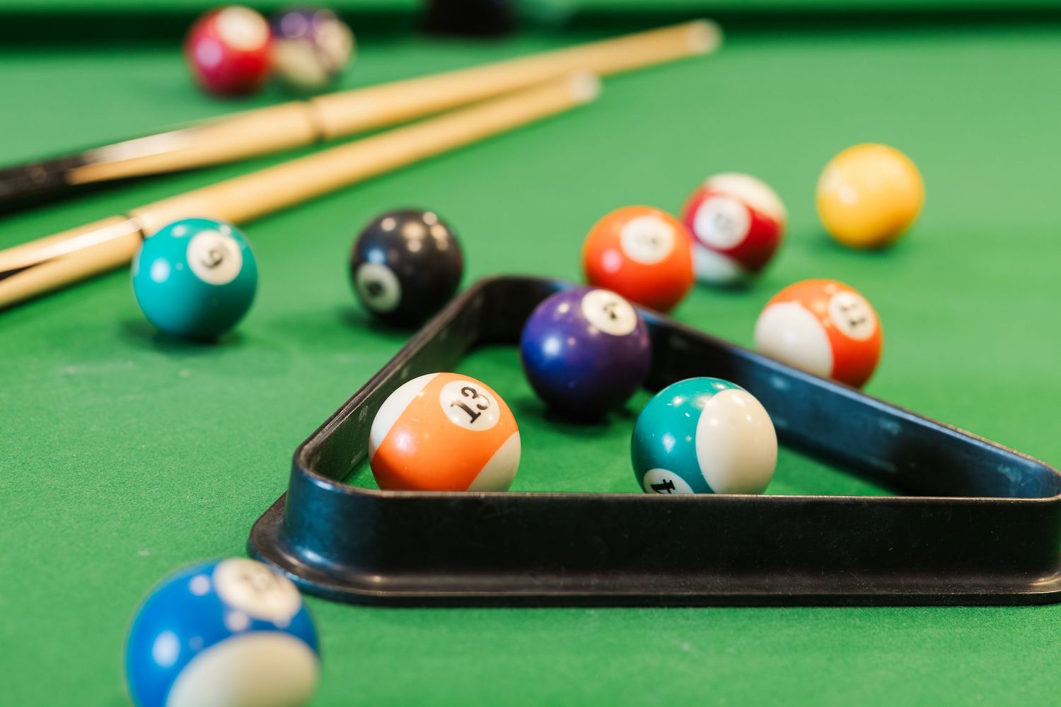 Beacon Hill senior living branding photo in Lombard, Illinois featuring billiards table and pool balls