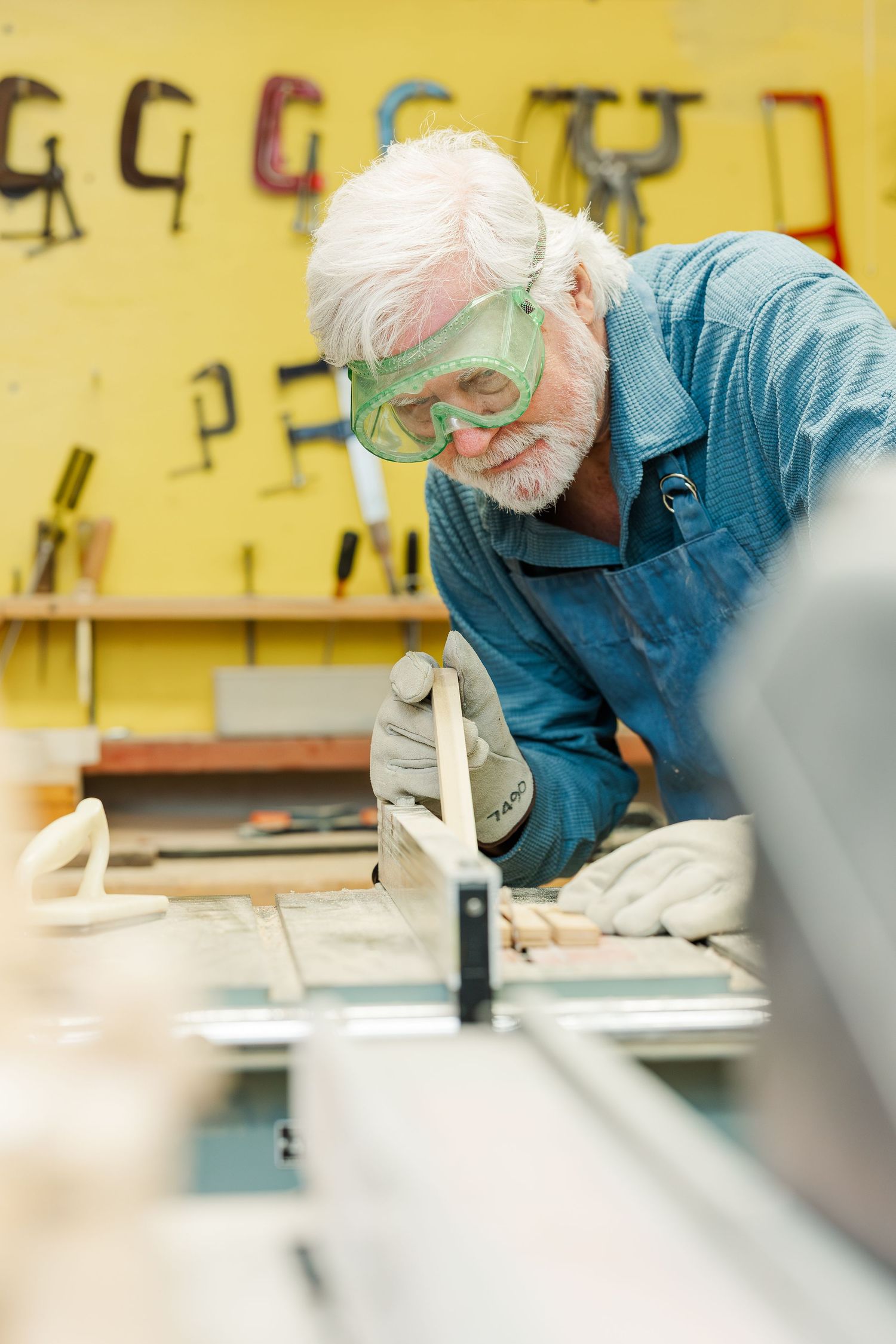Beacon Hill senior living branding photo in Lombard, Illinois featuring resident woodworking in shop