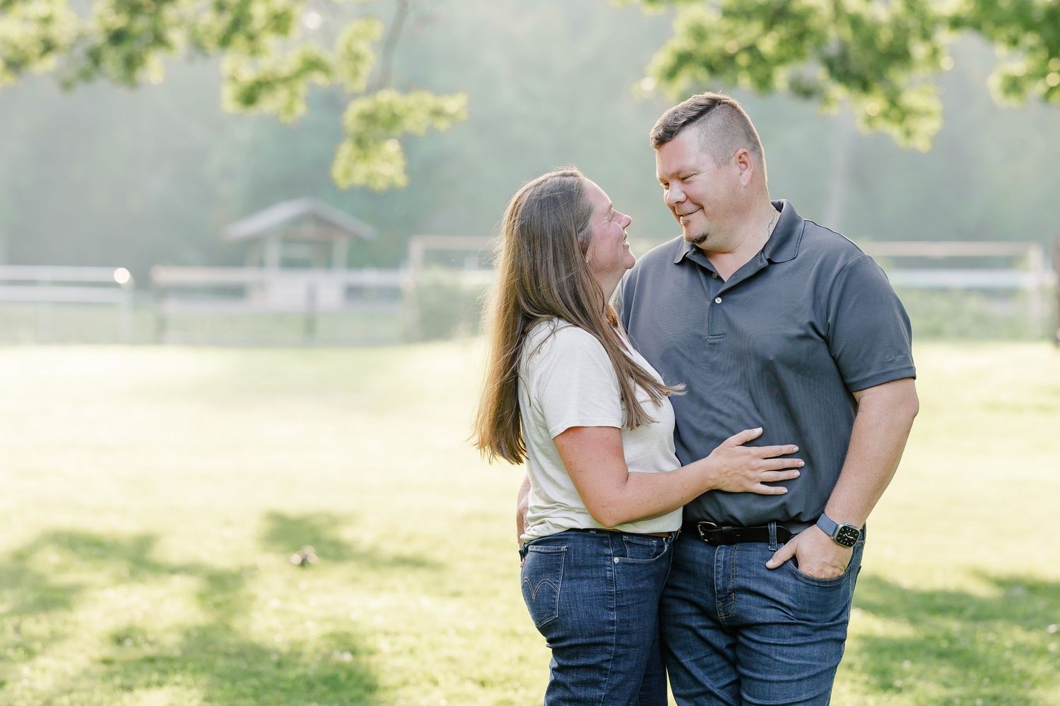 Husband and wife sharing a quiet moment during their family session in Bull Valley, Illinois.