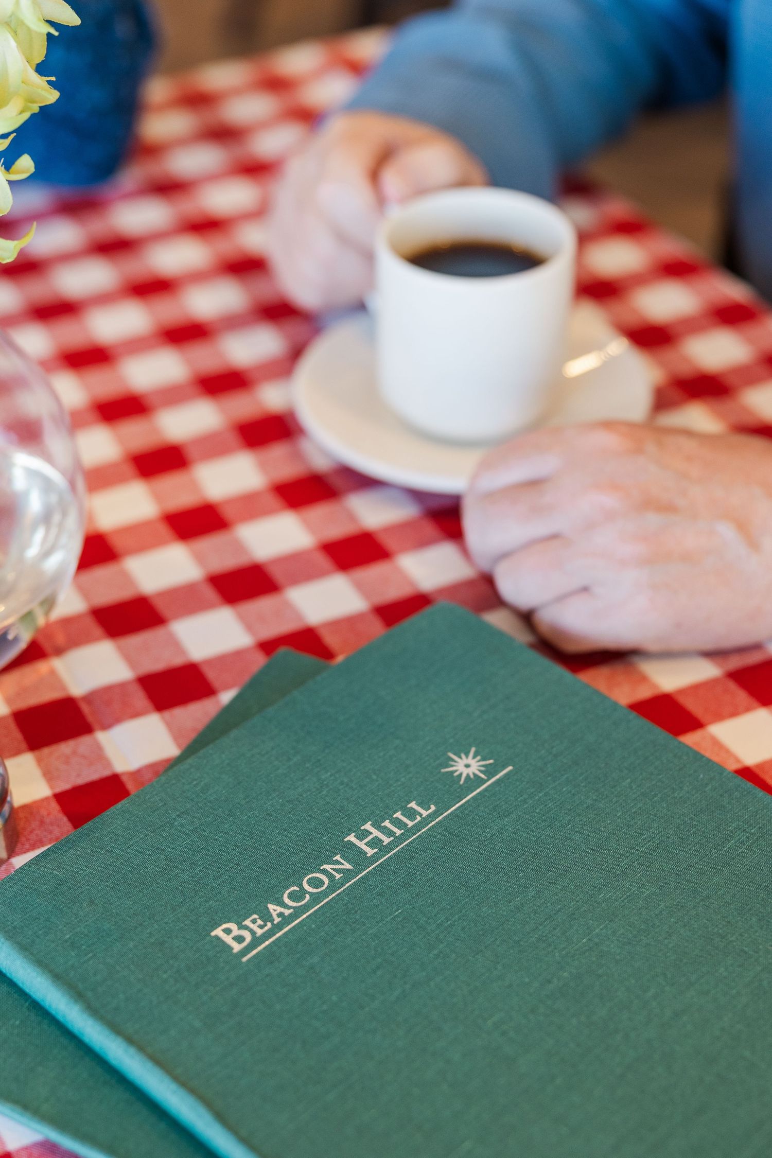 Beacon Hill senior living branding photo in Lombard, Illinois featuring coffee cup and community brochure