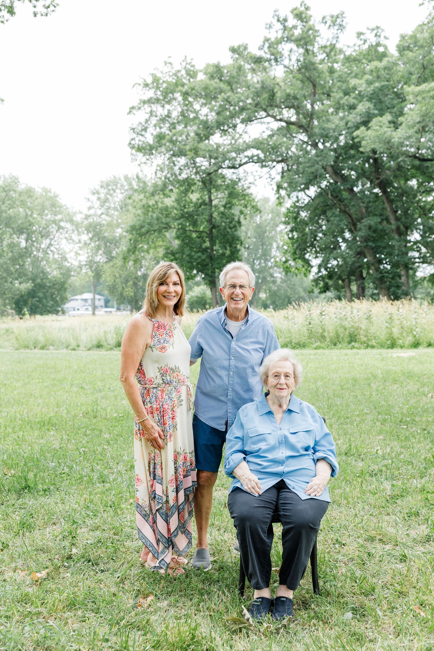 Three generations posed together at home during a summer extended family session in Crystal Lake, IL.