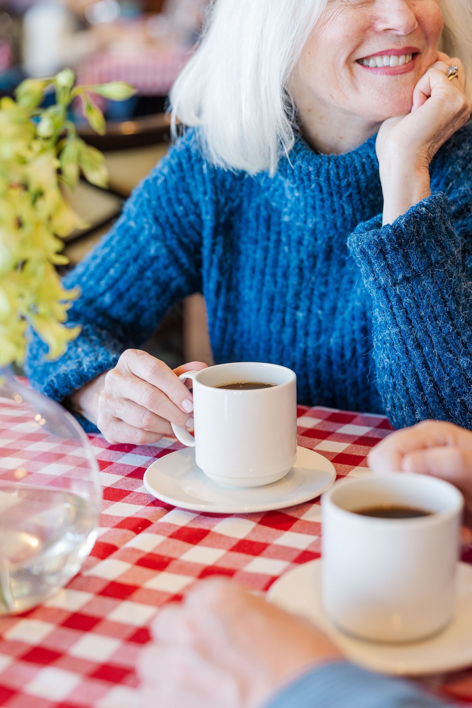 Branding photography at Beacon Hill Lifespace Community in Lombard IL featuring resident enjoying coffee