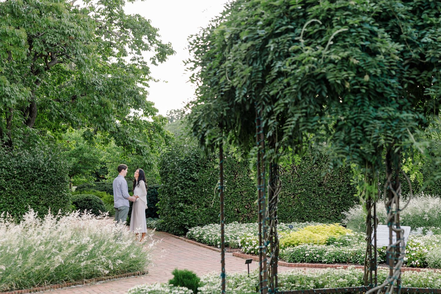 Alysia reacts as Jack surprises her with a proposal in the Octagon Garden at Cantigny Park.