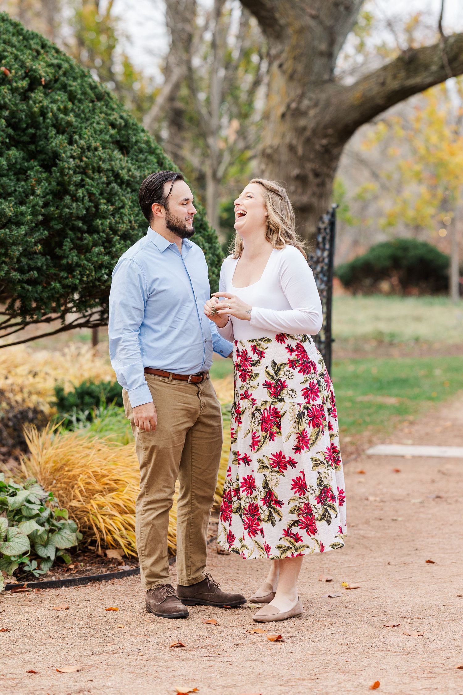 Man proposes to woman in the Keyhole Garden at Cantigny Park in Wheaton, IL