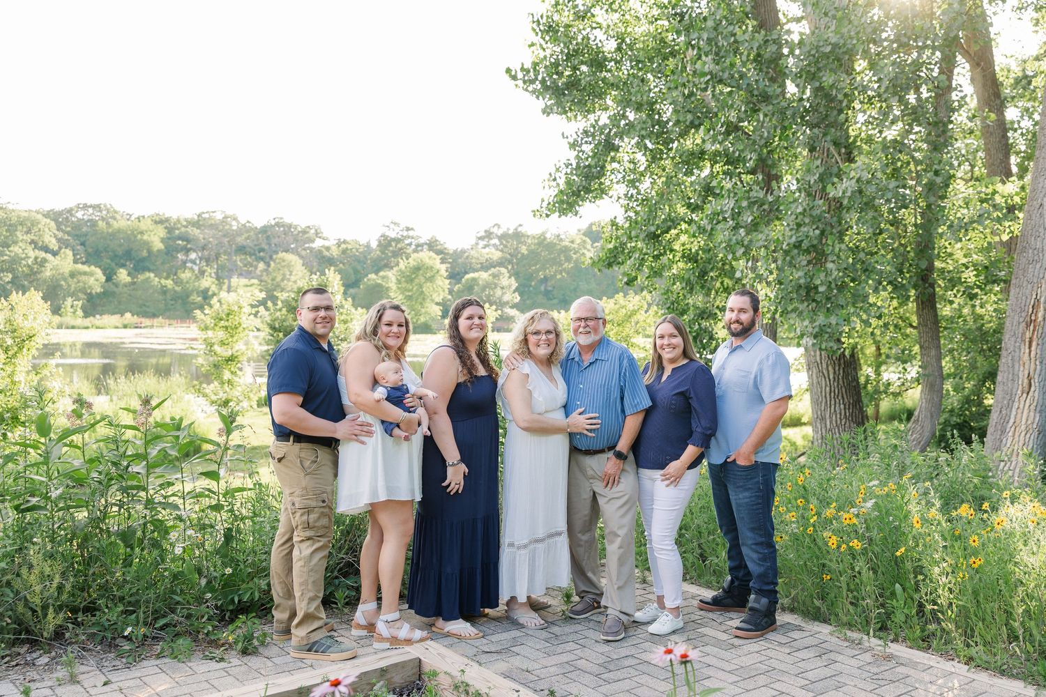 Extended family portraits at Veterans Acres Nature Center with parents, grandparents, and baby in Crystal Lake, Illinois