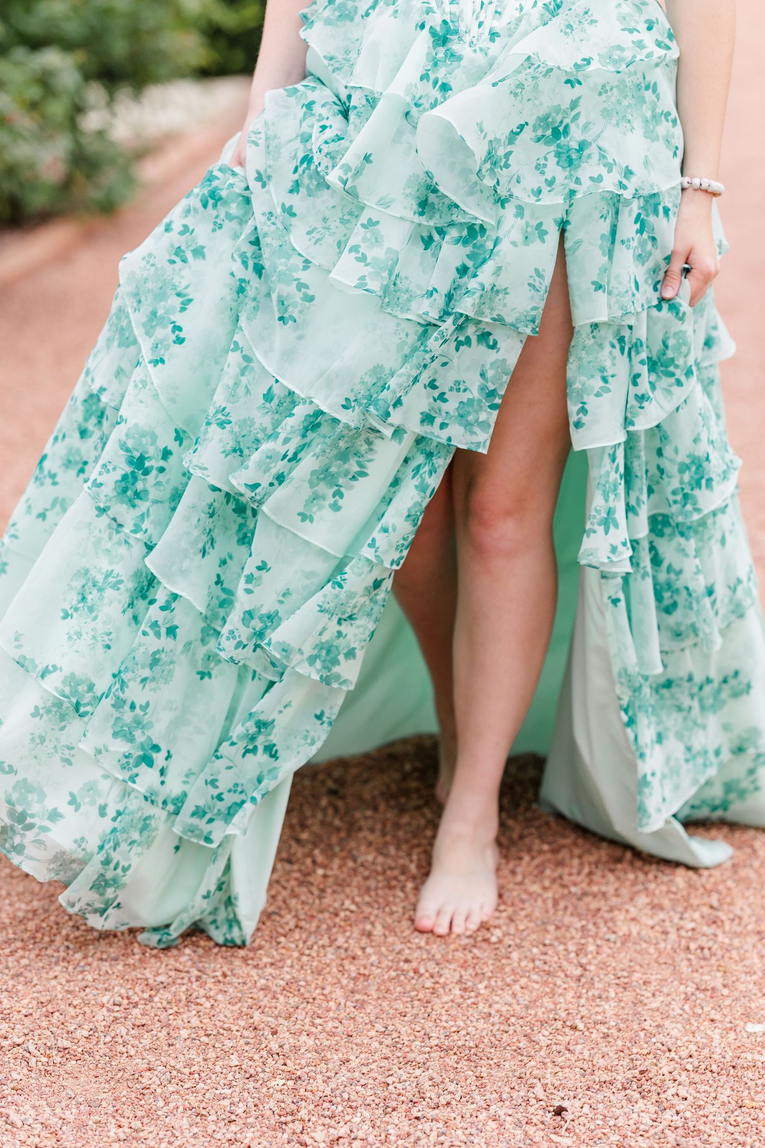Detail of Samantha’s flowing mint floral dress during her whimsical Cantigny Park senior session.