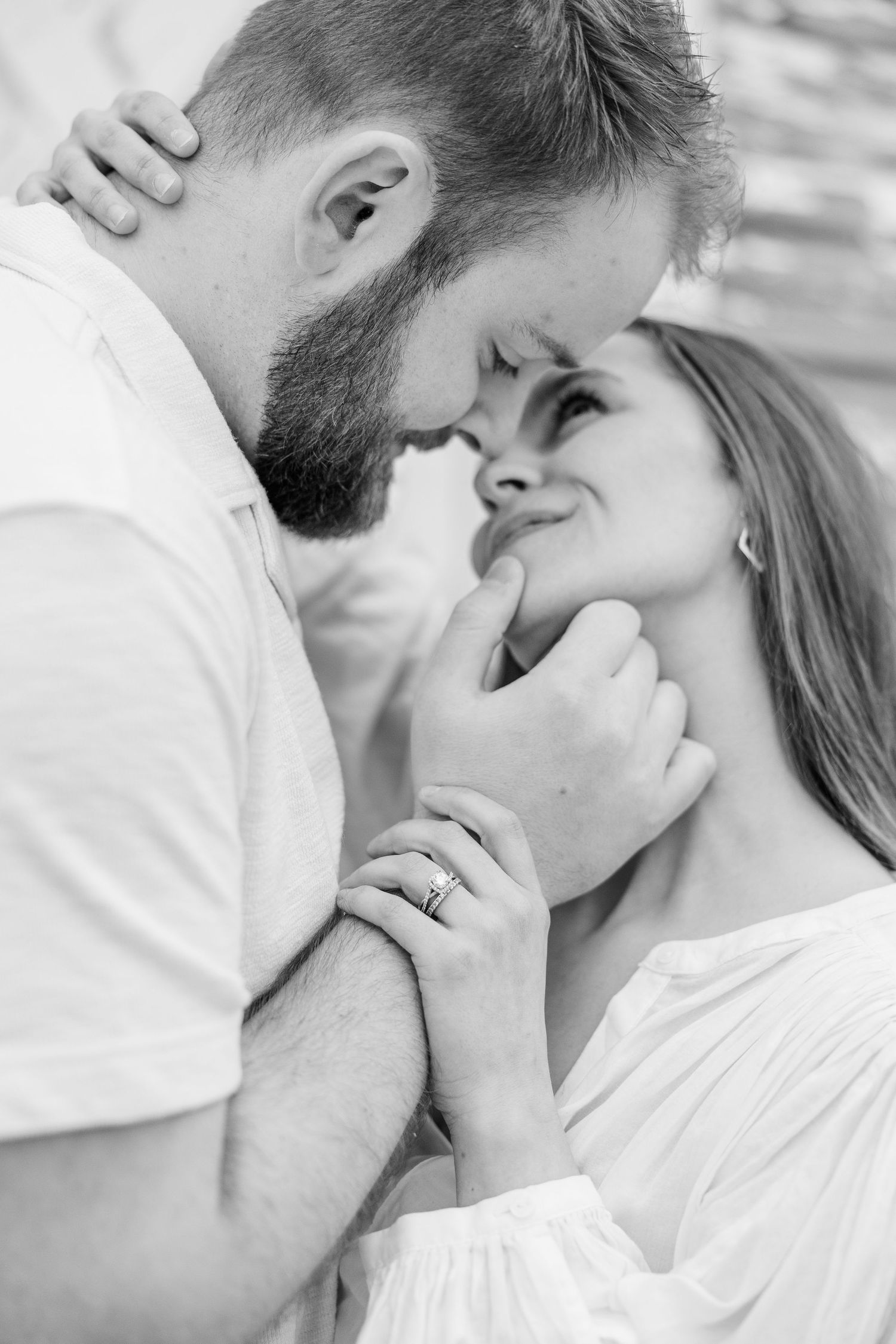 Close-up of couple embracing during pregnancy announcement photos in Cary, Illinois