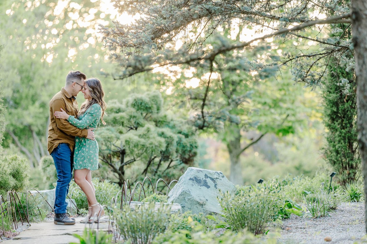 Cantigny Park engagement photos with soft evening light and garden scenery