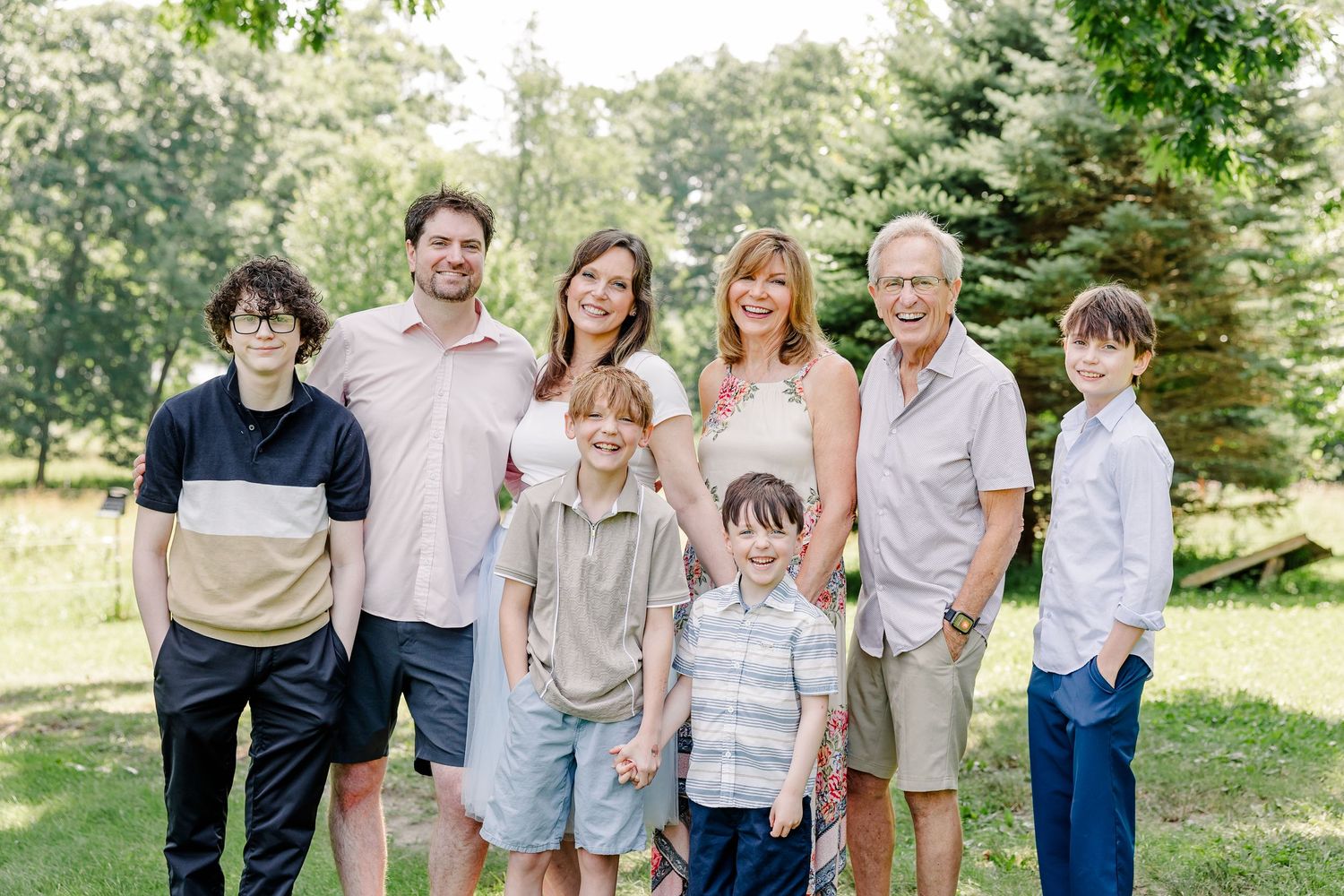 Extended family portrait with grandparents, adult children, and grandchildren in Crystal Lake, IL.