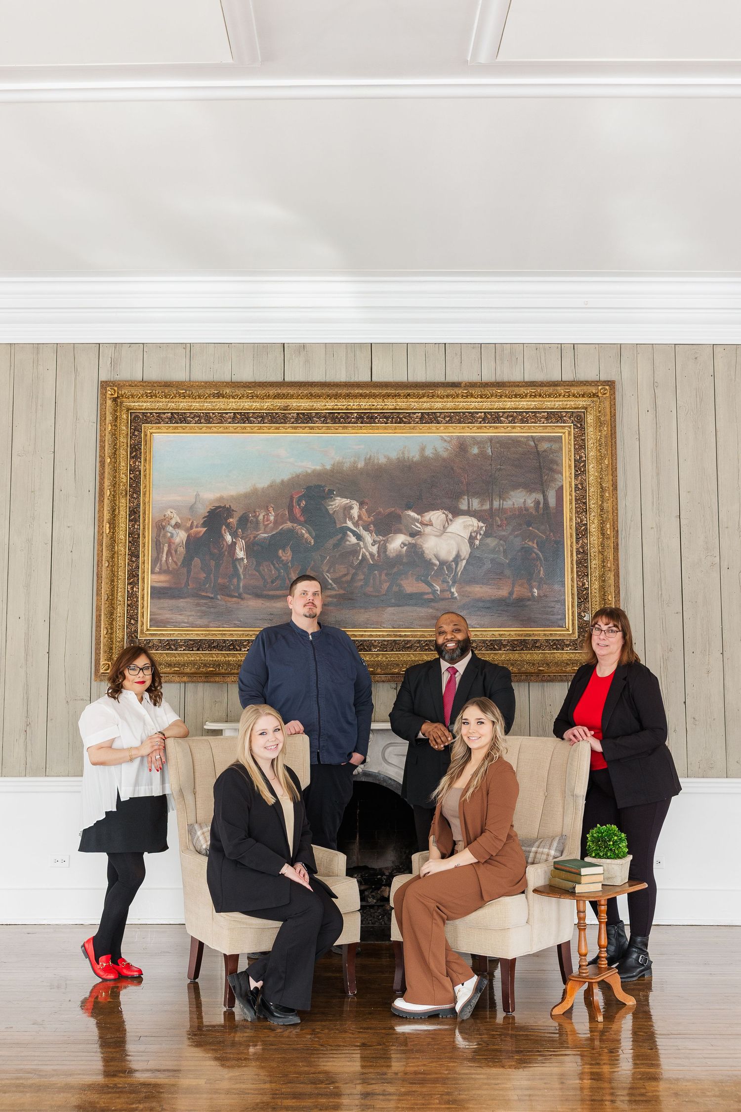 Dunham Woods Riding Club team headshots in Wayne, Illinois featuring staff portraits in the gray room