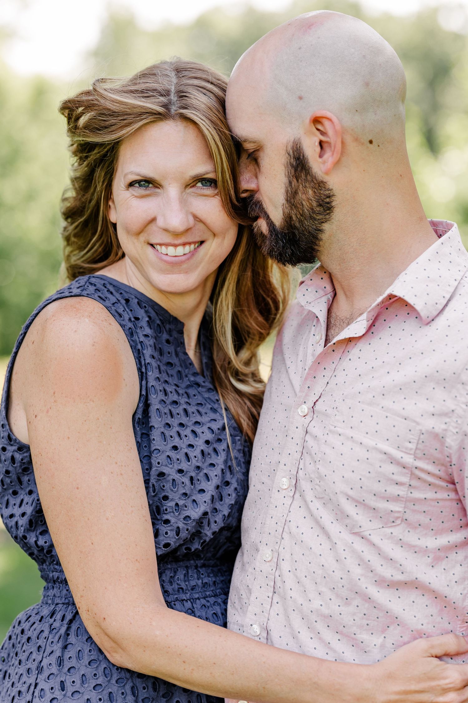 Couple portrait during a summer extended family session in Crystal Lake, IL by a Chicagoland family photographer.