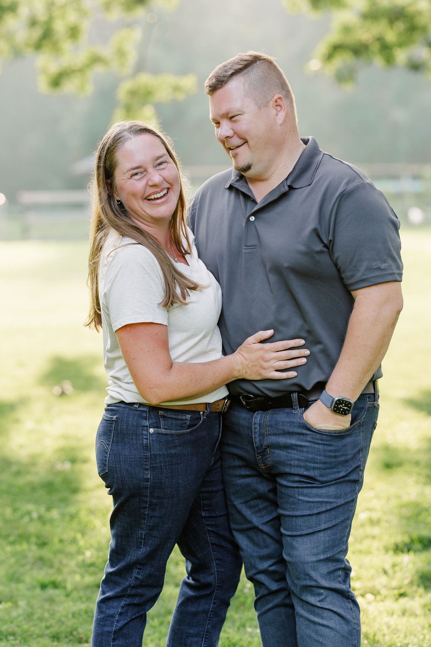 Parents smiling together during an at-home family session in Bull Valley, Illinois.