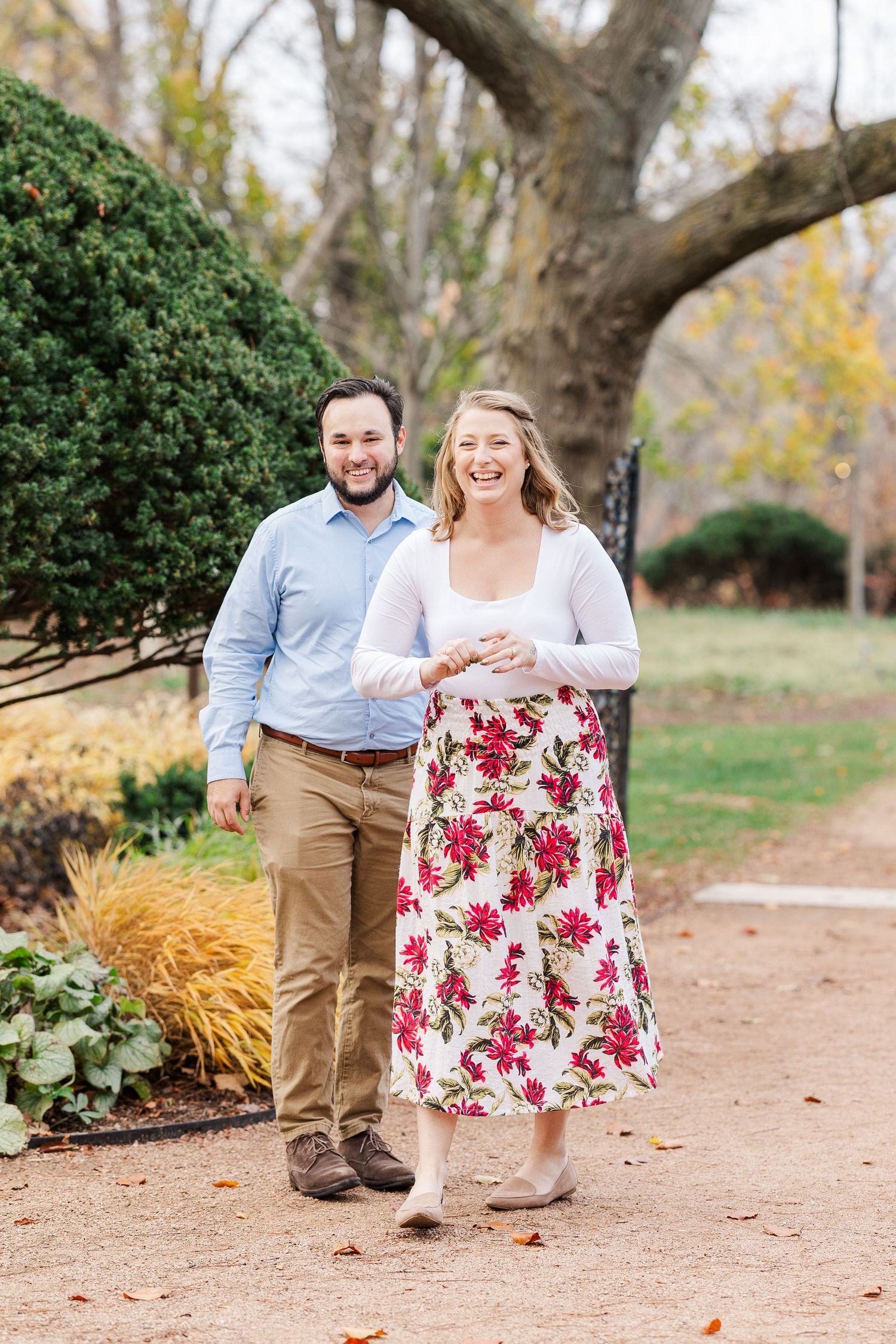 Man proposes to woman in the Keyhole Garden at Cantigny Park in Wheaton, IL