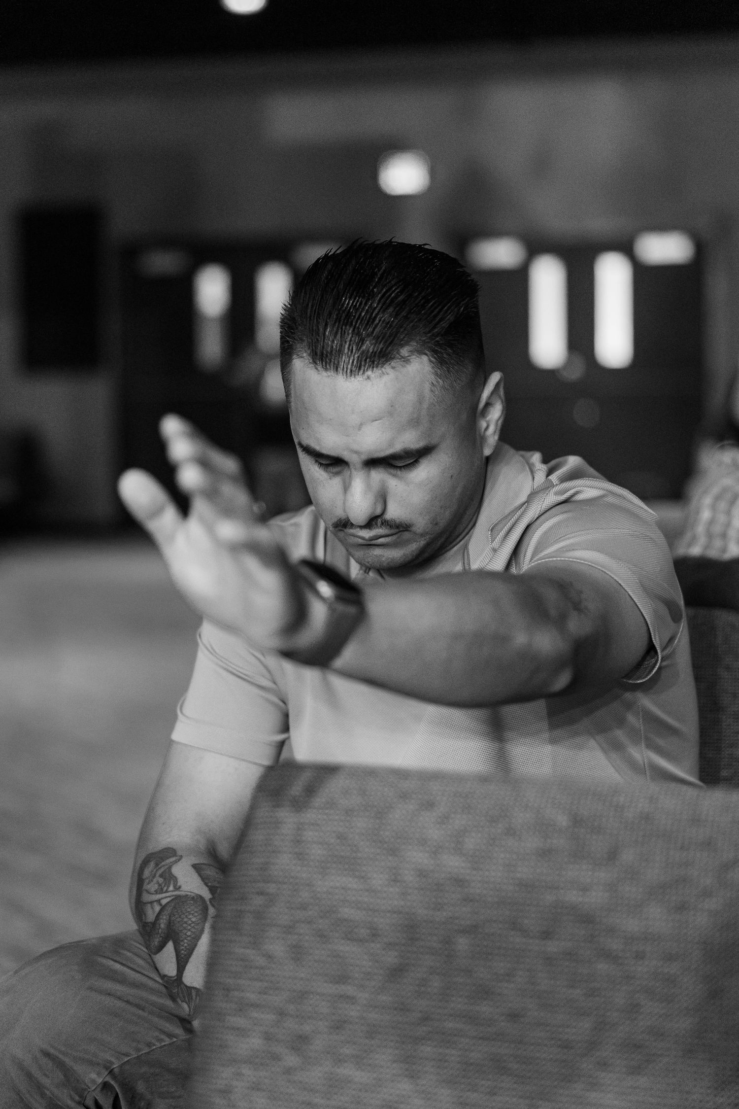 Man praying during a church service at The Chapel in McHenry