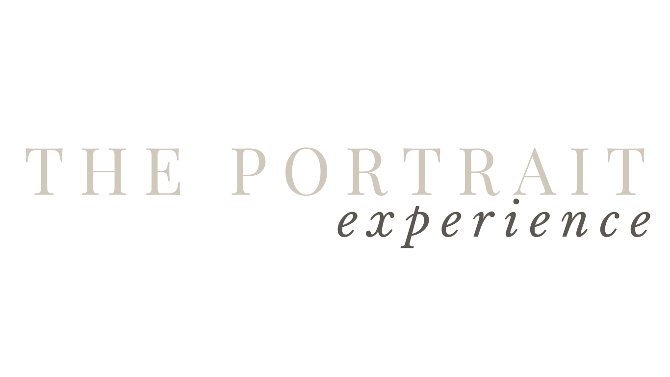 A soft and elegant text design displays 'THE PORTRAIT experience' in muted gray tones against a white background.