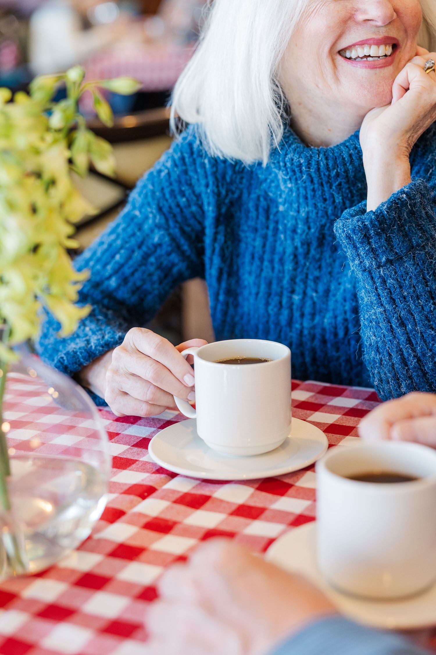 Beacon Hill senior living branding photo in Lombard, Illinois featuring residents enjoying coffee together