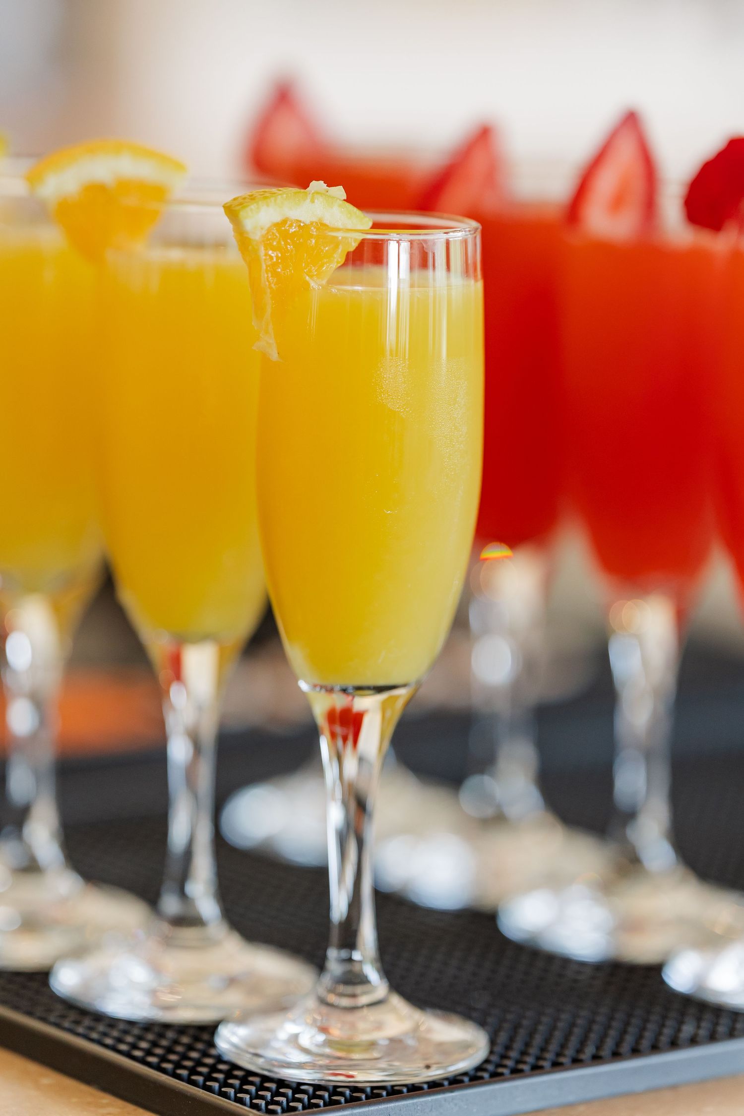 Mimosa and cocktail bar setup at wildflower bridal shower, Itasca Country Club