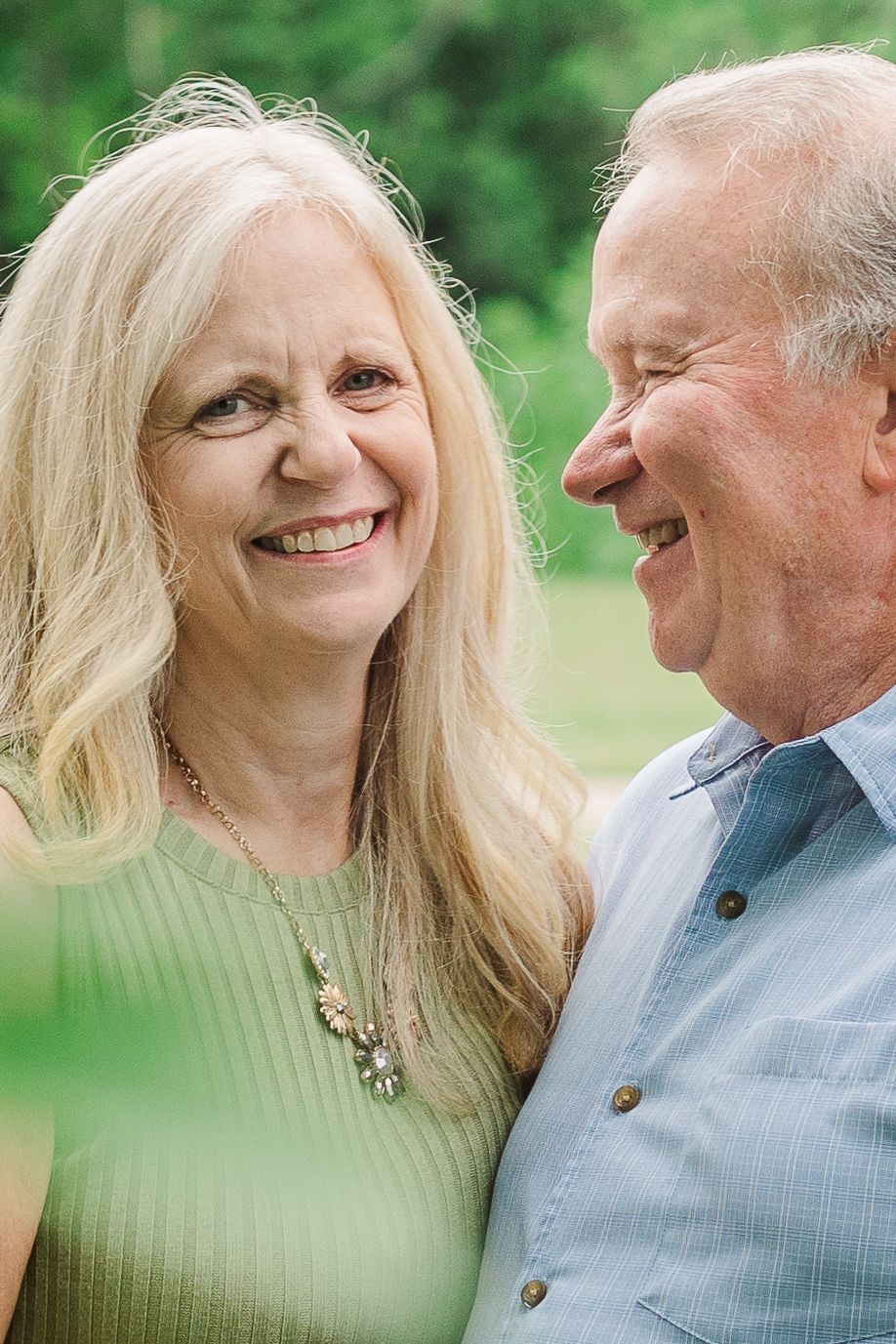 Candid outdoor portrait showing genuine happiness and connection.