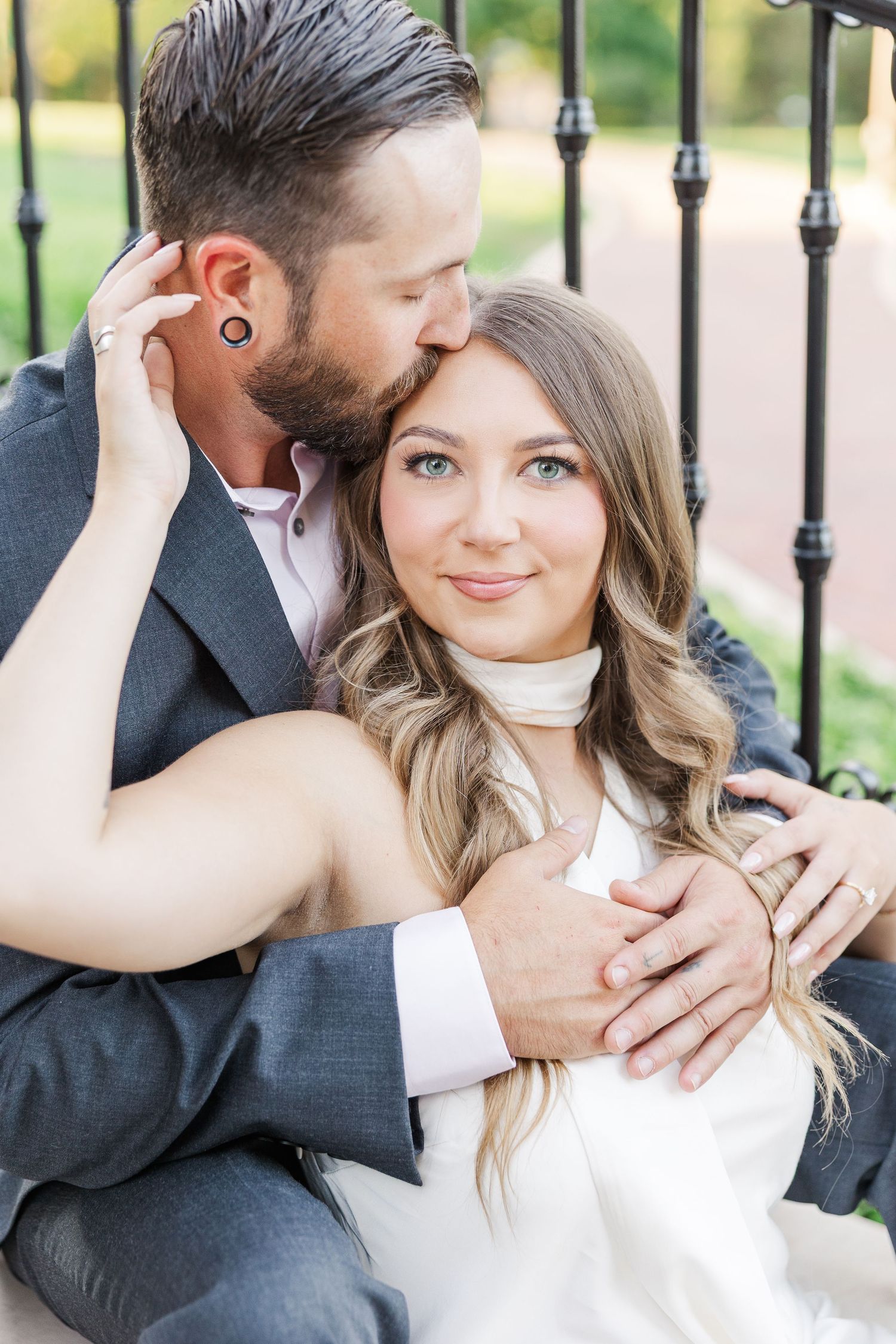 Couple embracing during engagement photos at Cantigny Park in Wheaton, Illinois