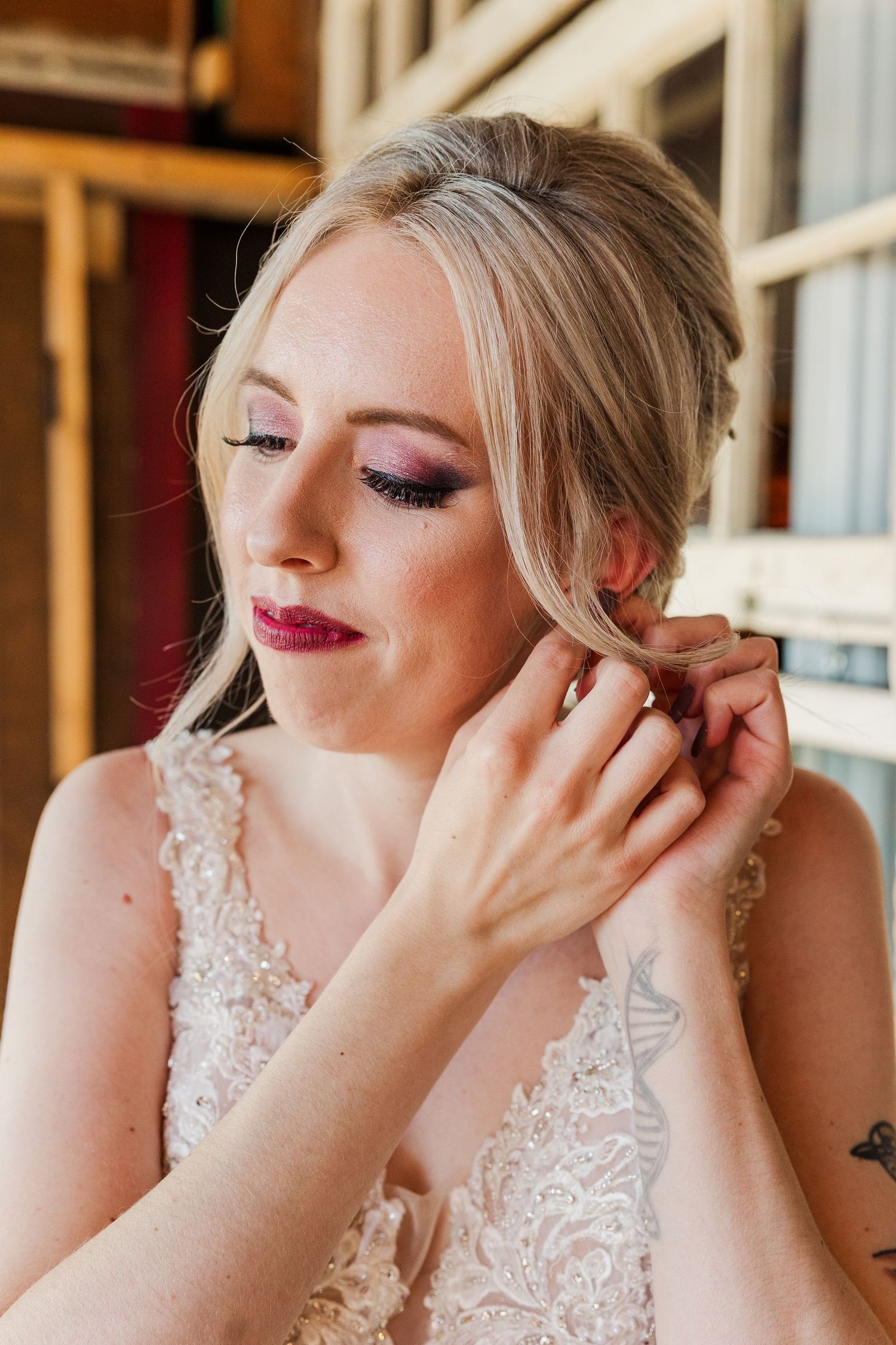 Elegant bridal portrait showing delicate lace details and romantic styling.