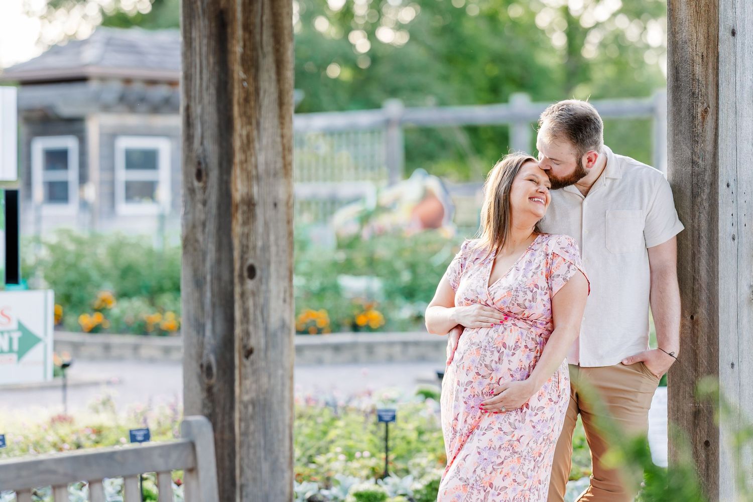 Romantic maternity portrait of expecting parents in the gardens at Cantigny Park in Wheaton Illinois