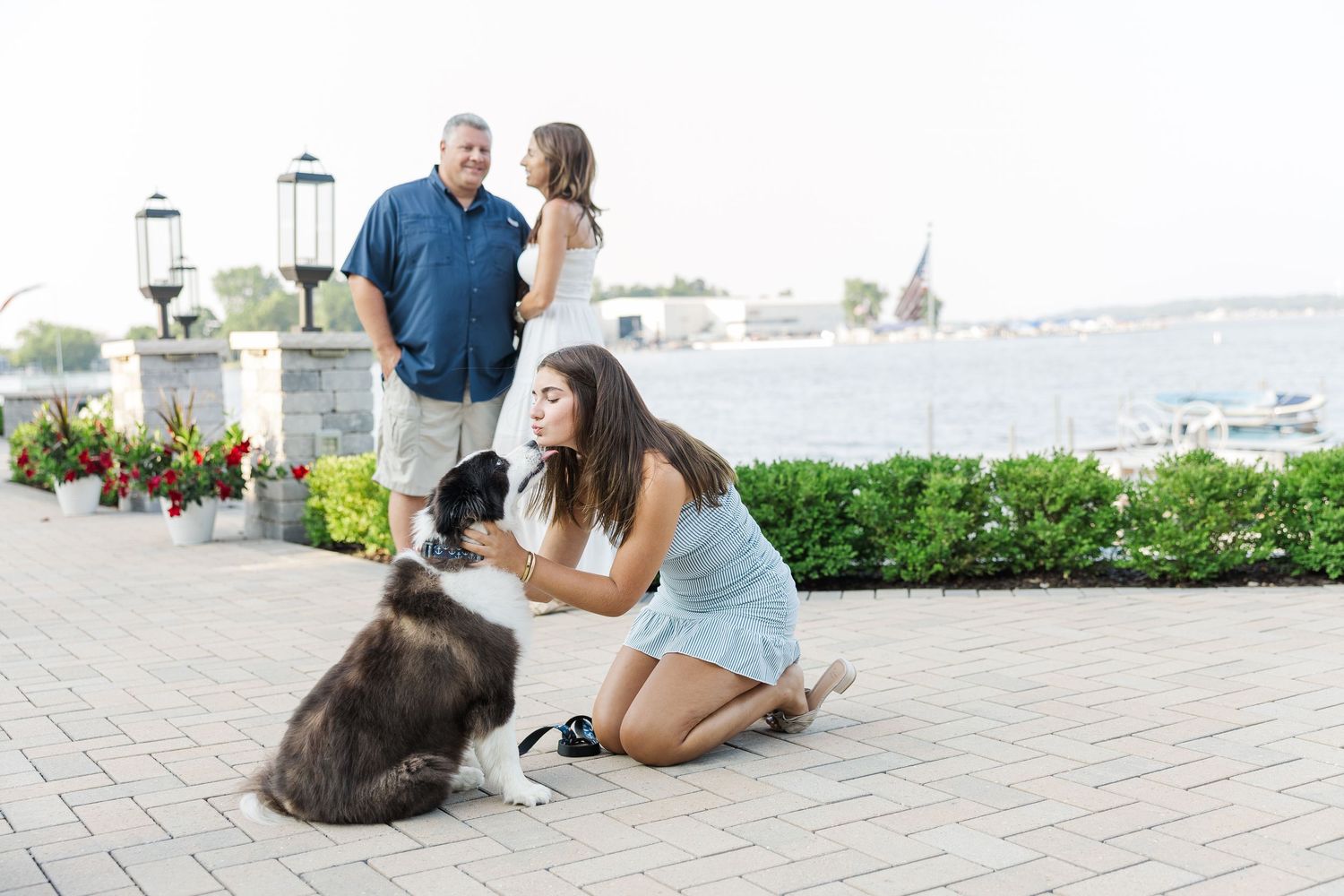 Family with dog during Pistakee Lake family photos in Johnsburg, Illinois