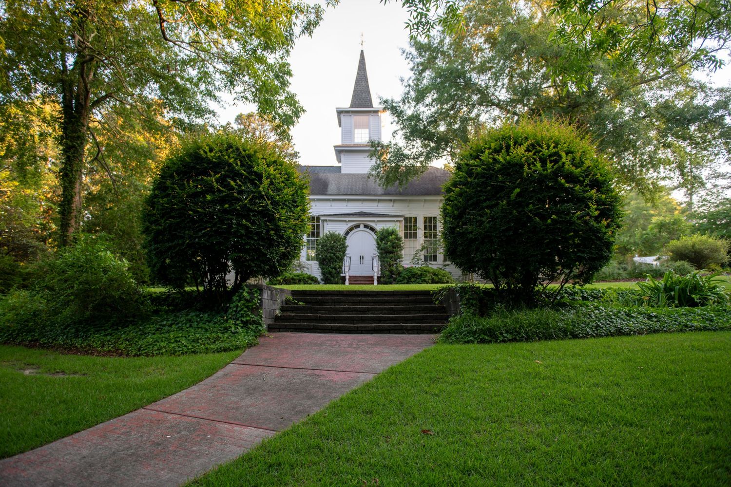 Leonard L. Price Gardens in Lexington SC, a beautiful outdoor family photo location with greenery, flowers, and natural light.