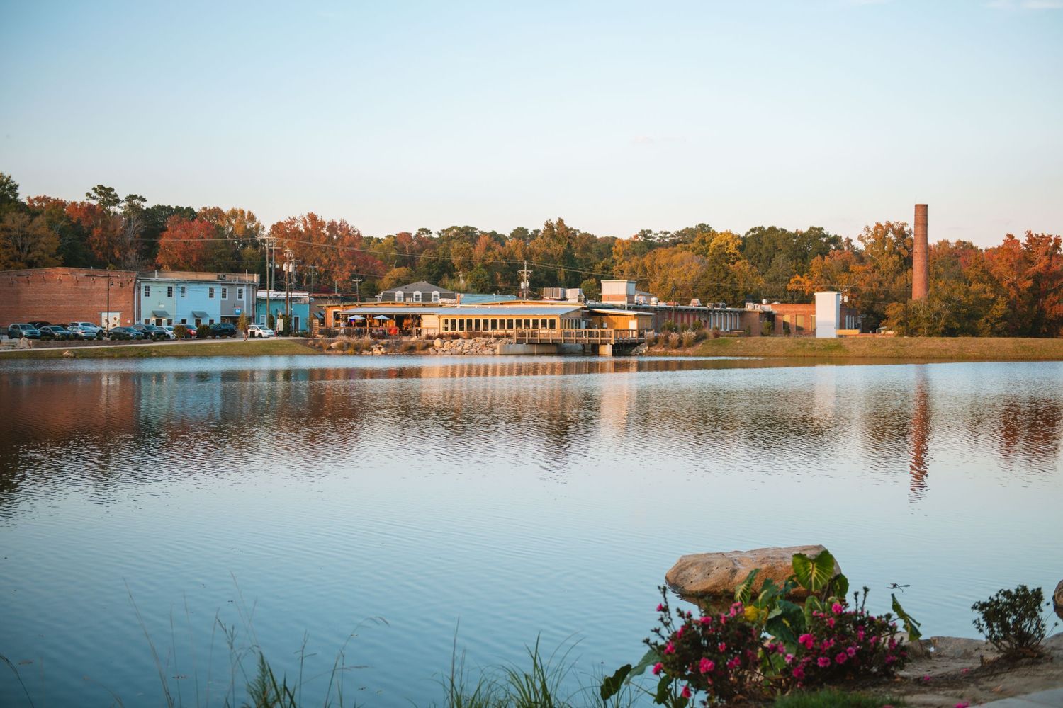 Old Mill Pond in Lexington SC, a charming family photo spot with water, rustic scenery, greenery, and timeless outdoor portraits.