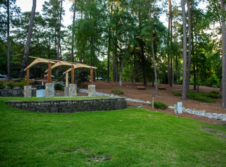 Gibson Pond Park in Lexington SC, a scenic family photo location with water views, trails, trees, and natural outdoor portraits.
