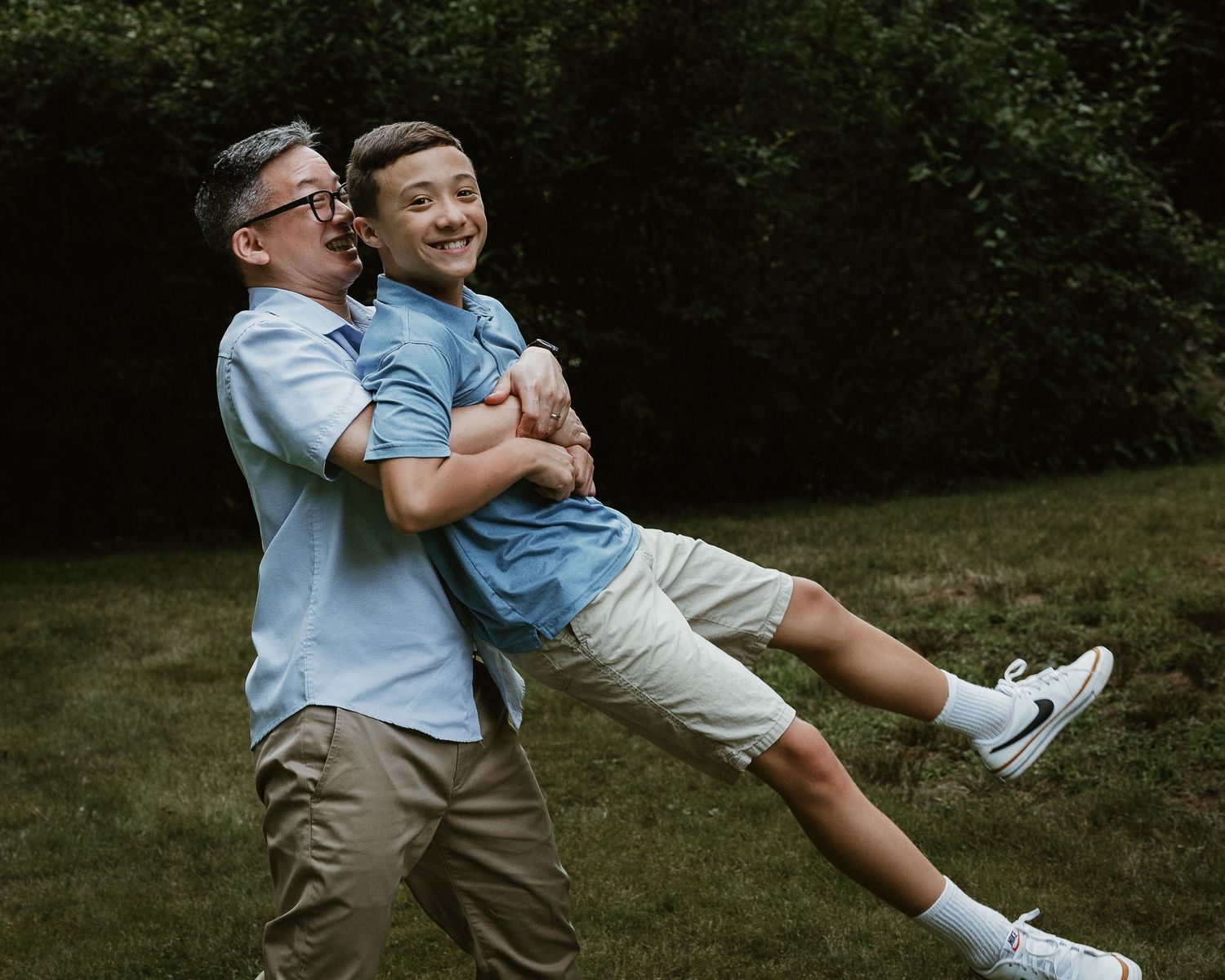 Playful father and son portrait from a family photography session in Woodbridge, CT