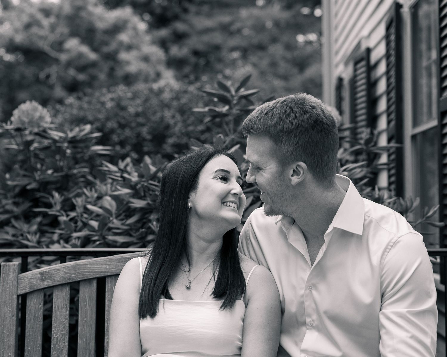 Couple almost kissing on bench, Woodbridge Town Center CT photographer