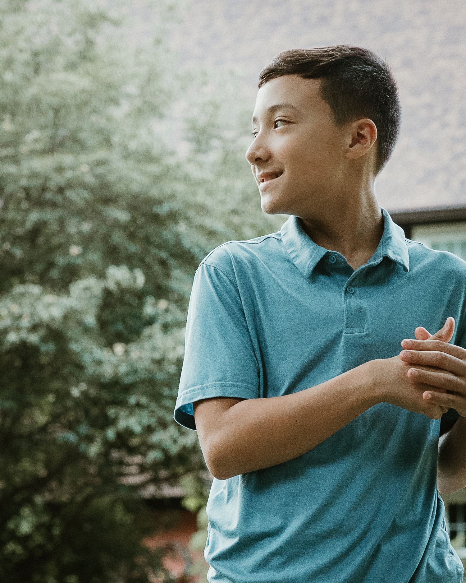 Teenage boy portrait outdoors from a Woodbridge CT family photography session