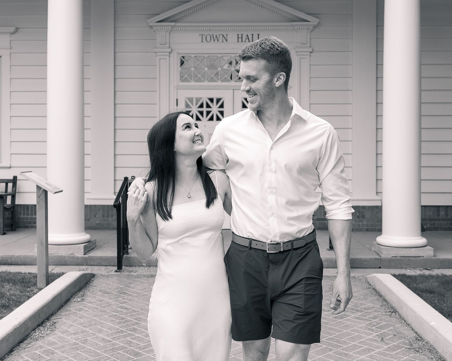 Couple walking in front of Woodbridge Town Hall, Connecticut elopement photography