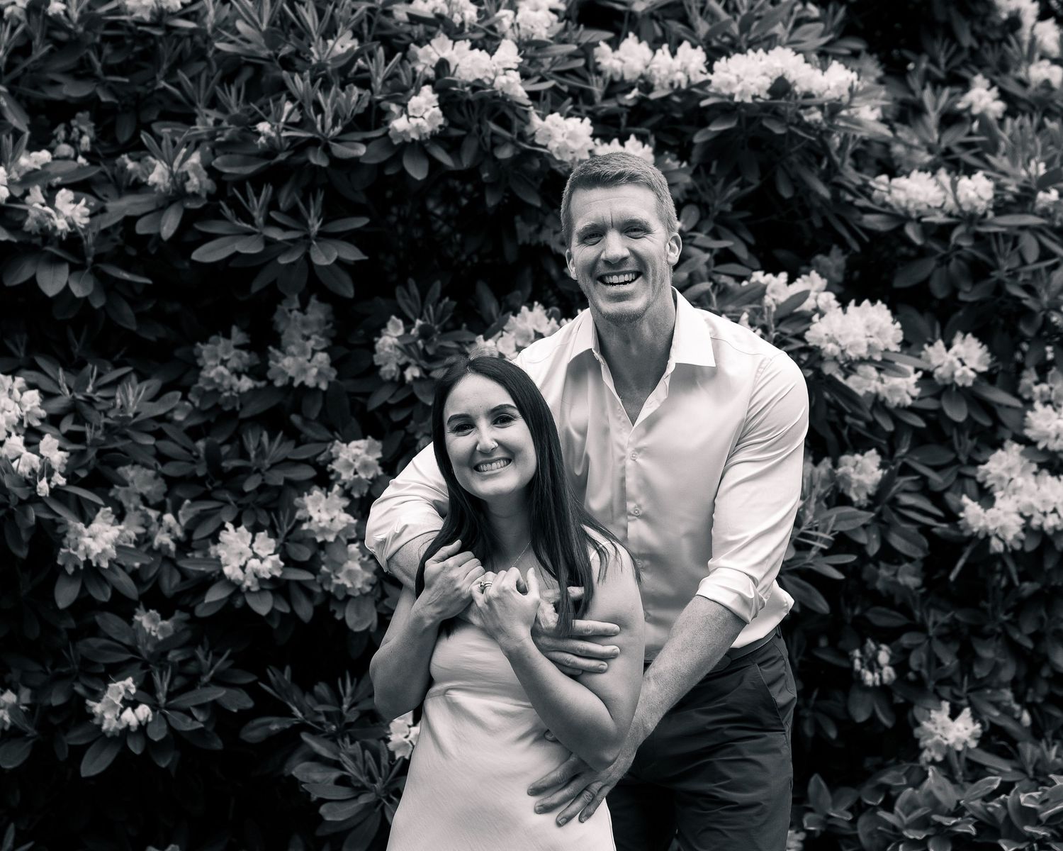 Couple laughing in rhododendron garden, Woodbridge Town Center Connecticut