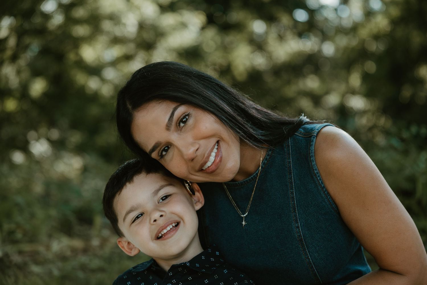Mother and son smiling close together outdoors, family photographer Woodbridge Connecticut