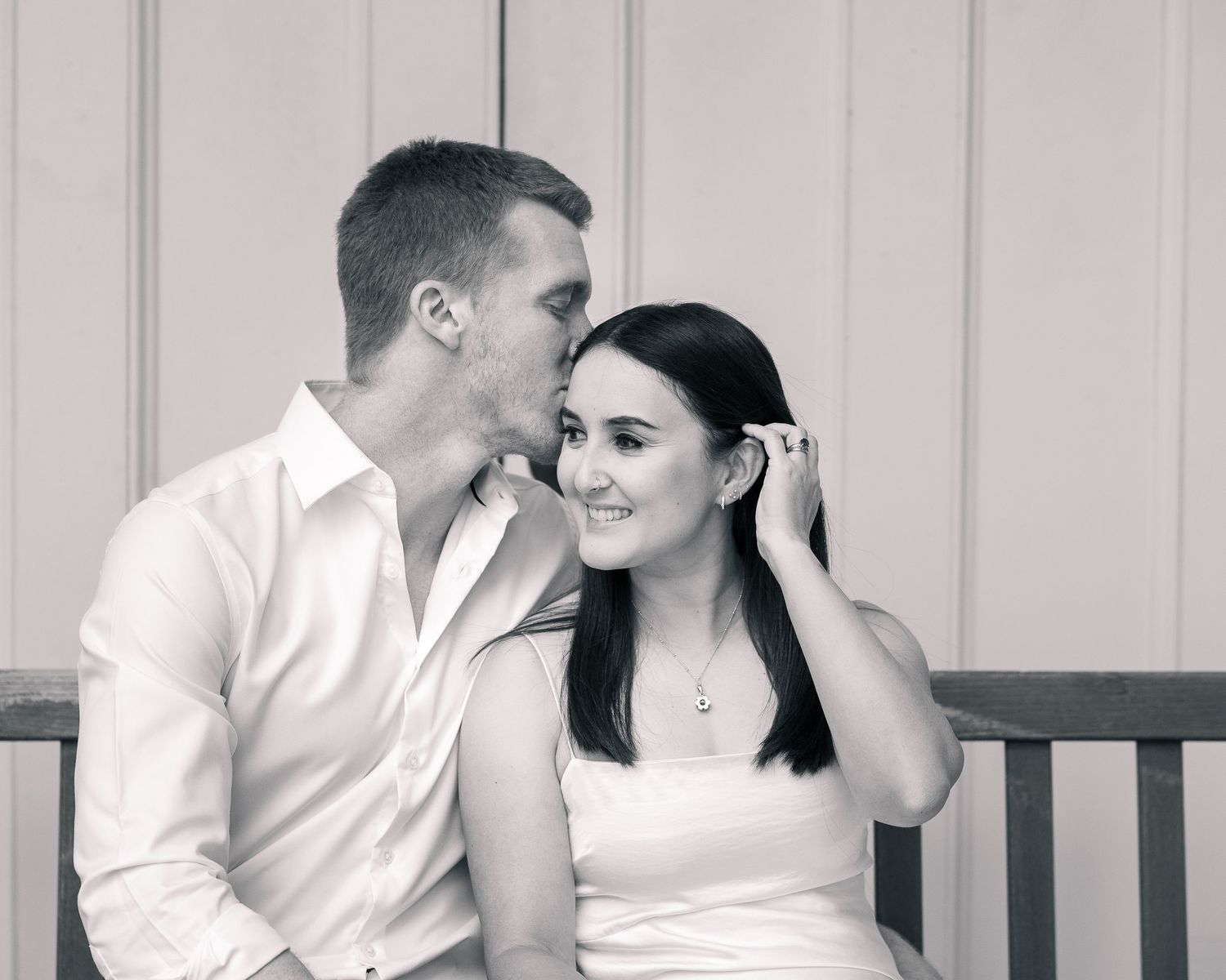 Couple at Woodbridge Memorial Hall bench, CT elopement portrait session