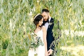 Couple under willow tree wedding portrait, bridal editorial photography Manhattan Bride magazine